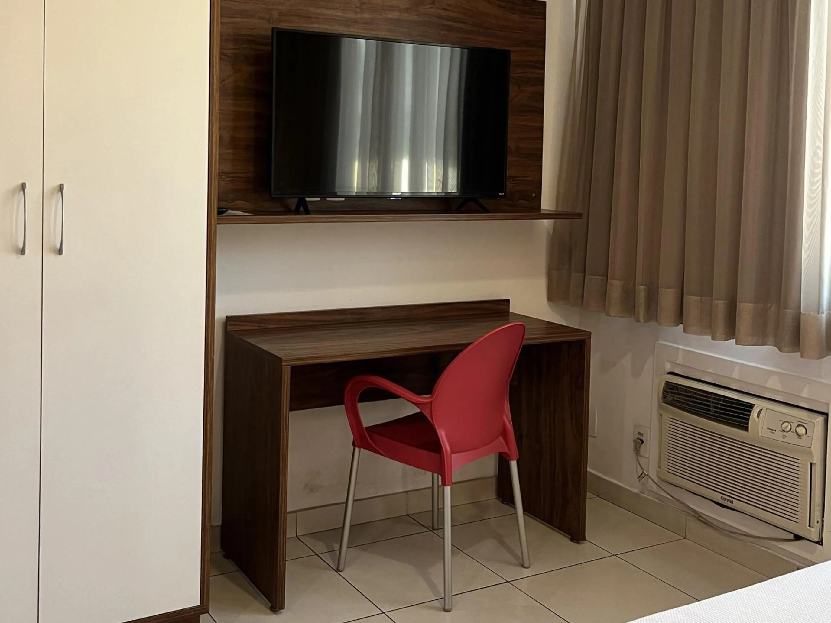 TV and multimedia in Hotel Flat Itaipava