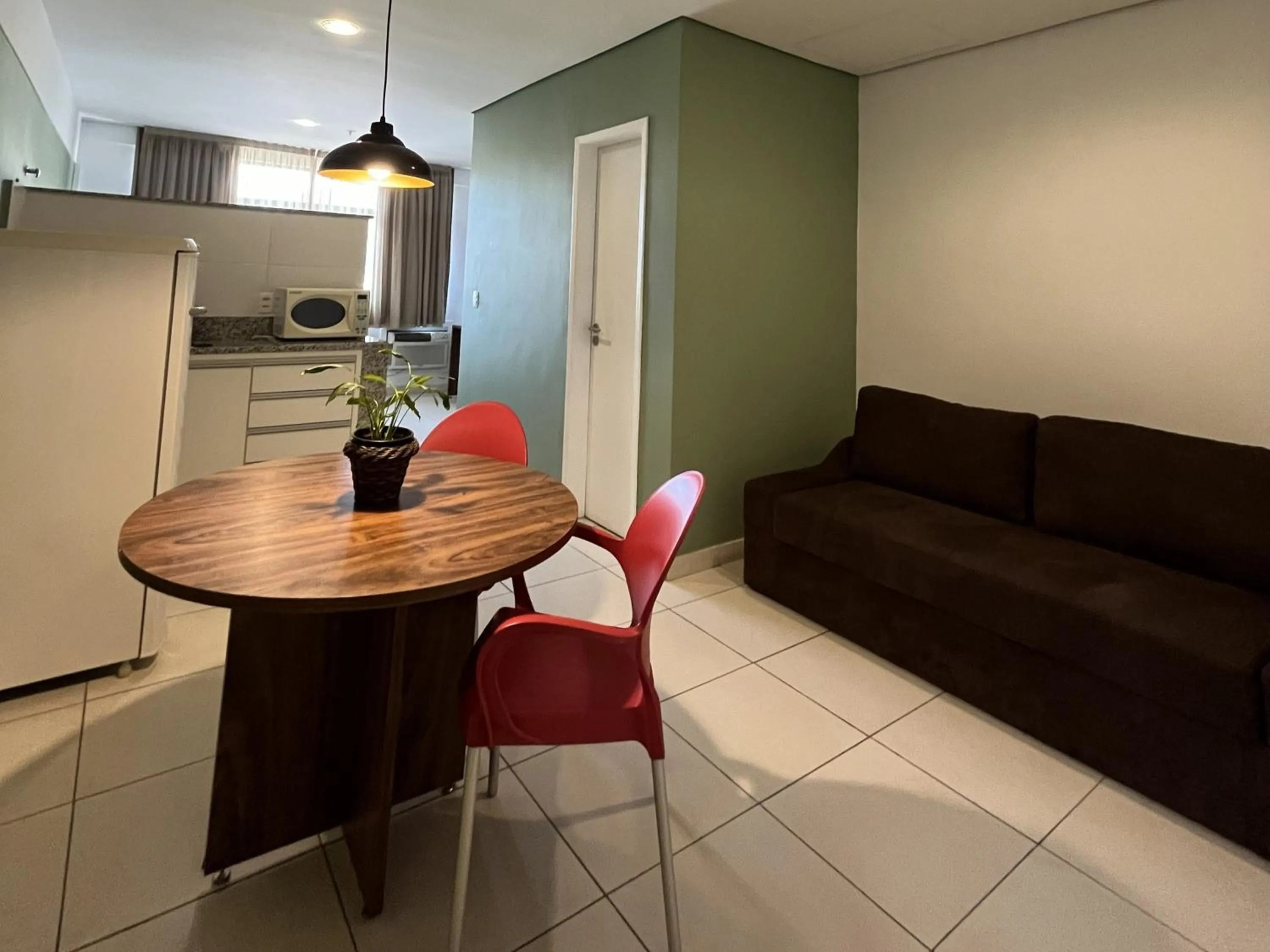 Kitchen or kitchenette in Hotel Flat Itaipava