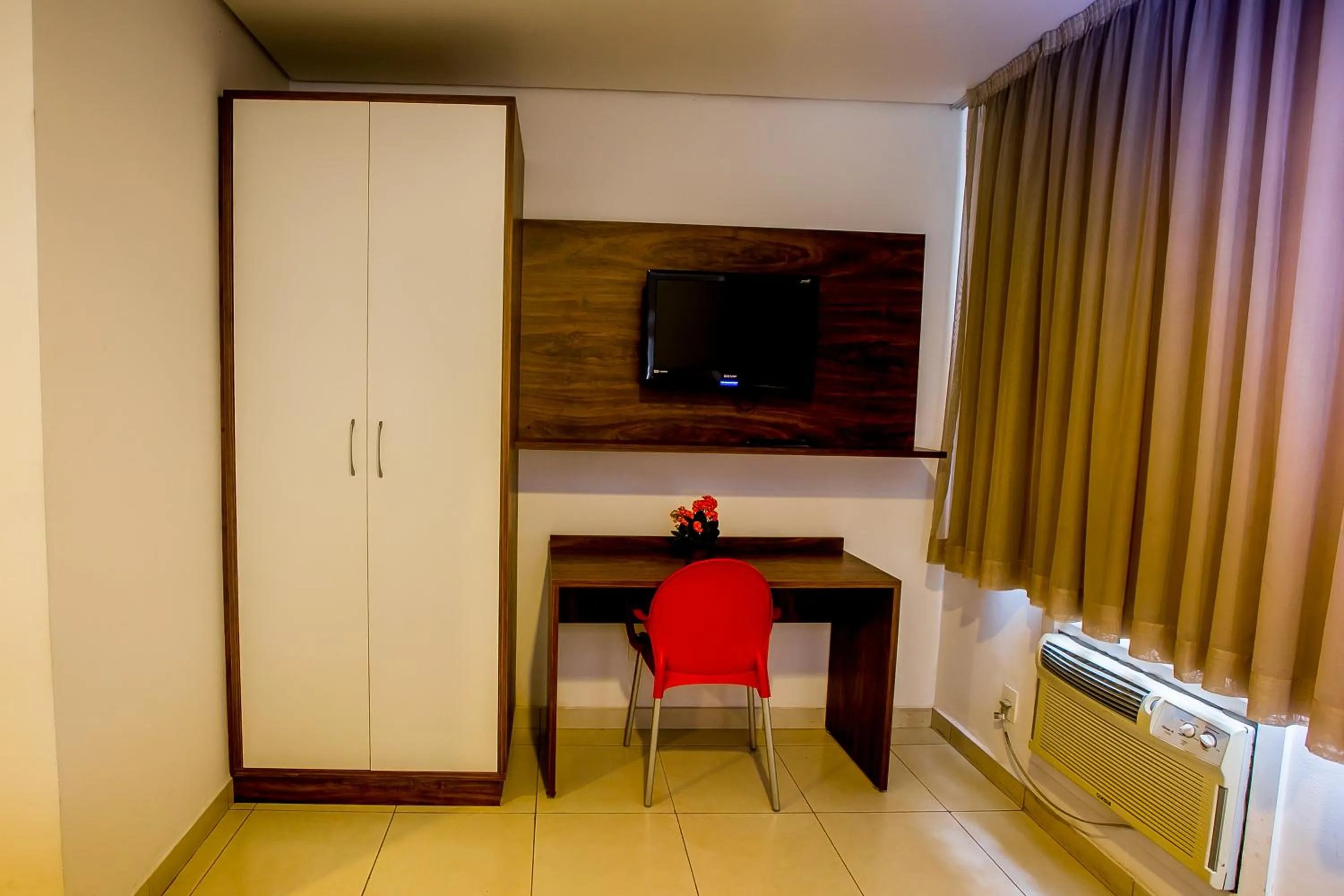 TV and multimedia in Hotel Flat Itaipava