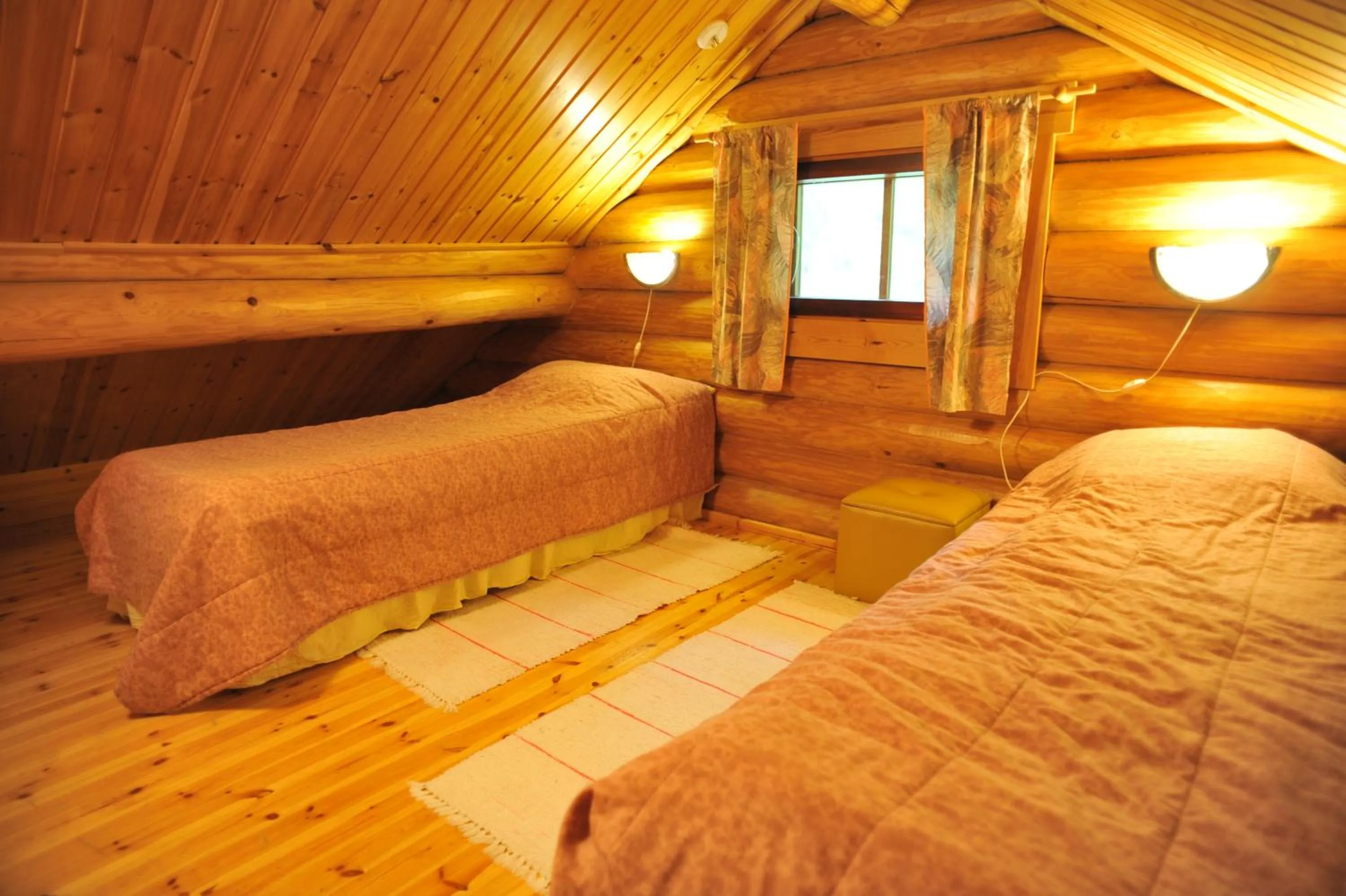 Decorative detail, Bed in Yli-Kaitala Holiday Resort Tuuliviiri