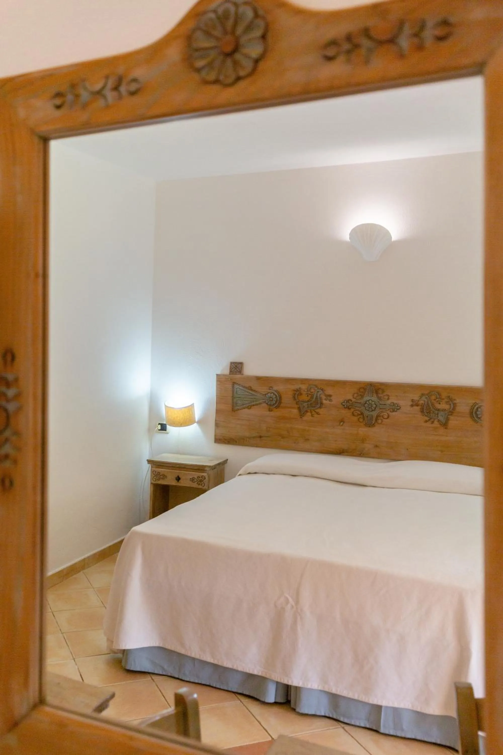 Bed in Porto Giunco Residence