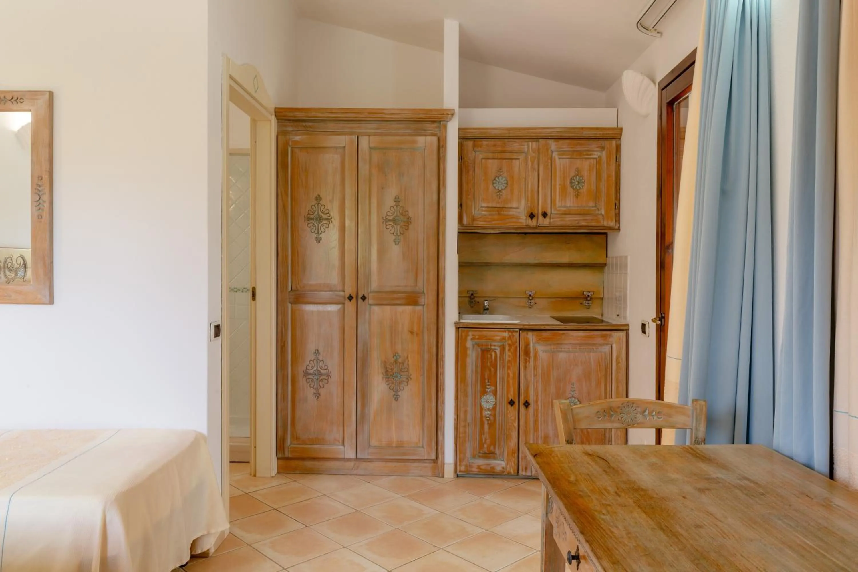 stove, Bed in Porto Giunco Residence