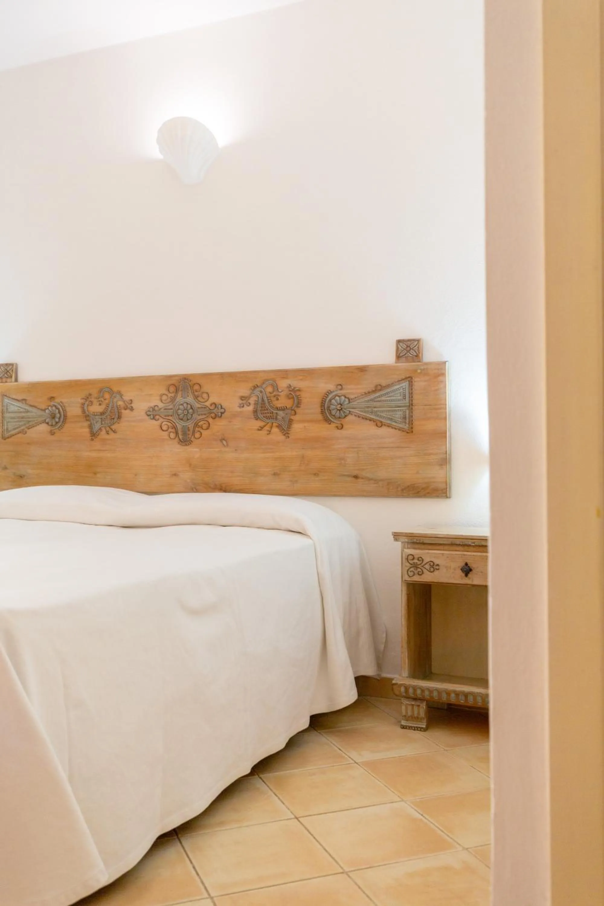 Bed in Porto Giunco Residence