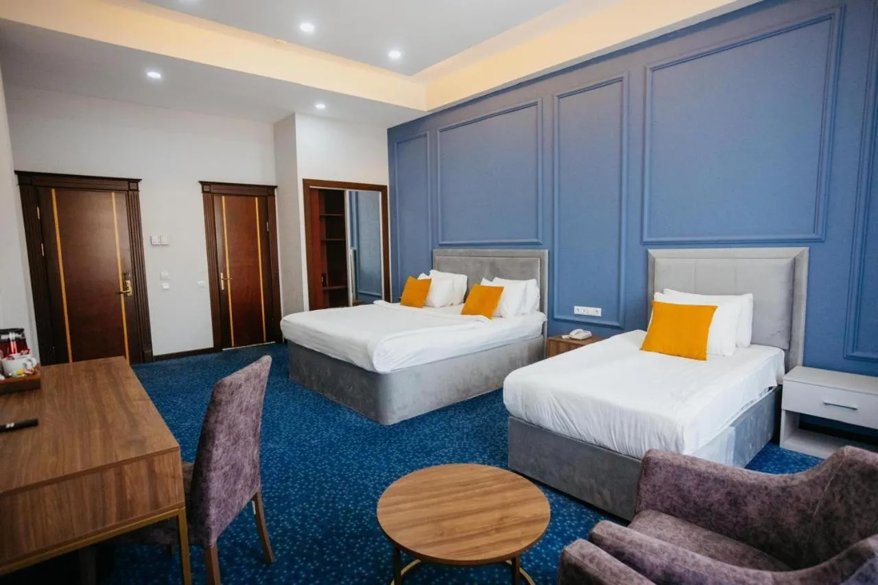 Property building, Bed in Grand Hotel Baku Central Park
