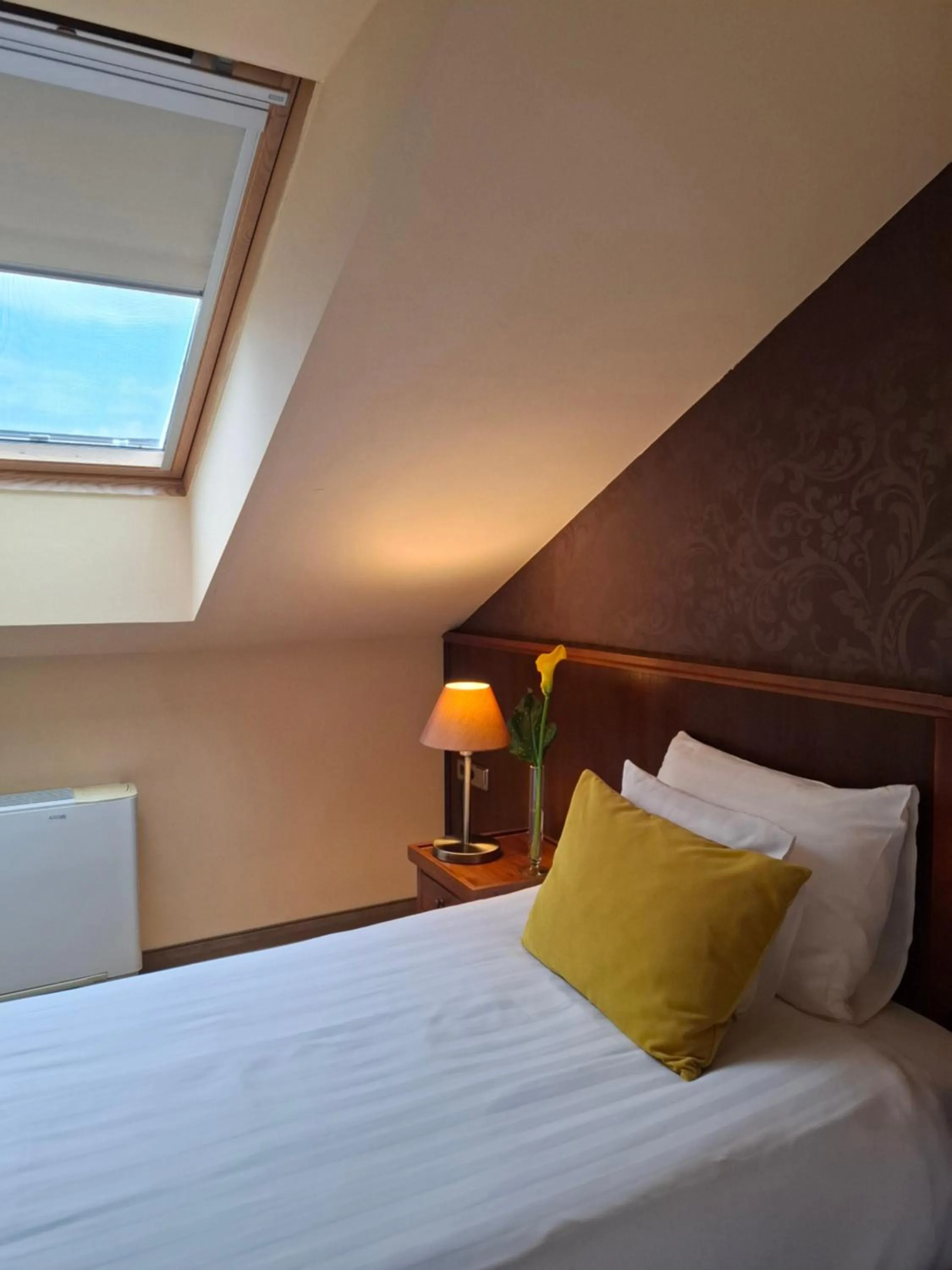 Bed in Szépia Bio and Art Hotel