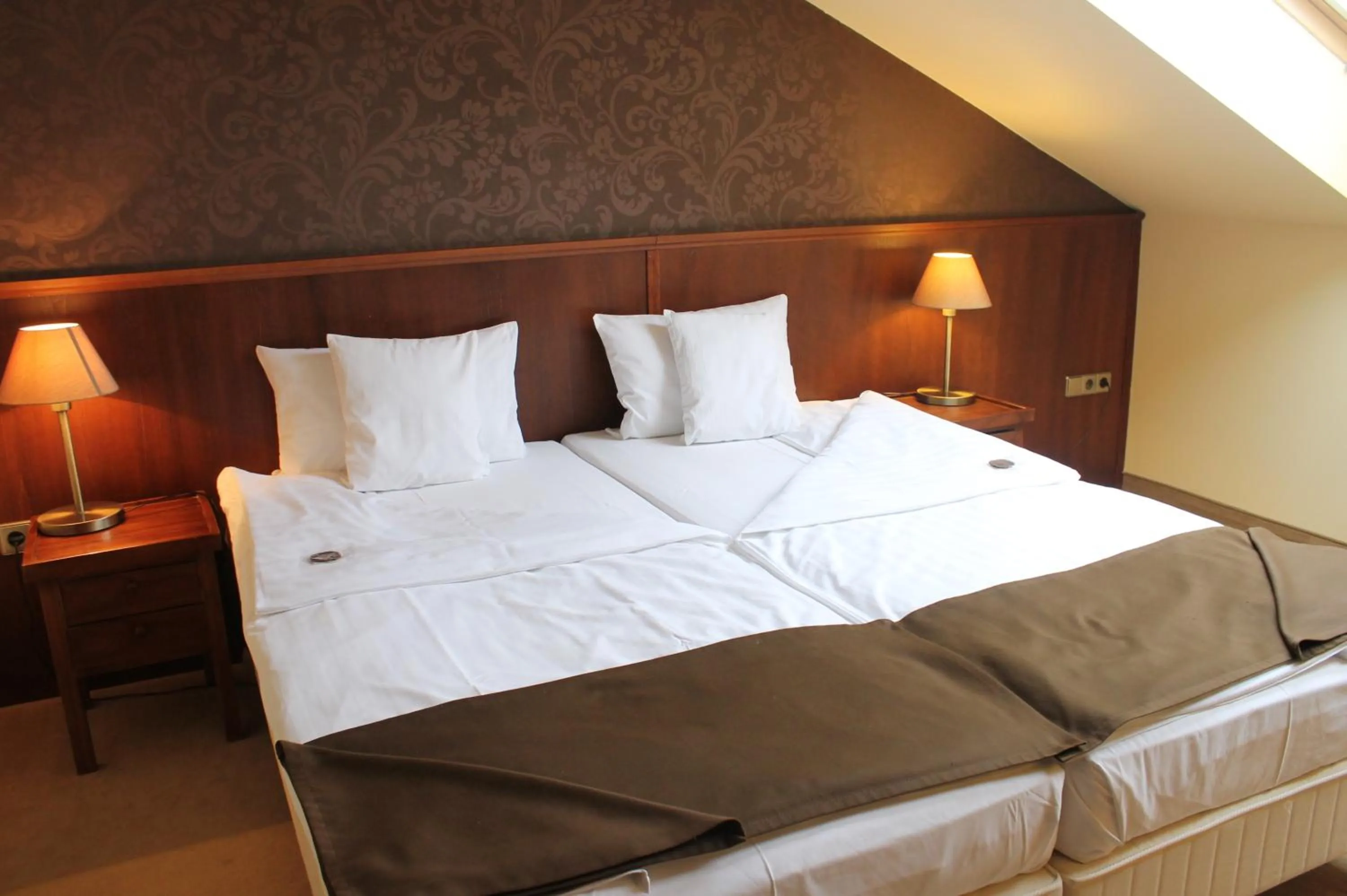 Bed in Szépia Bio and Art Hotel