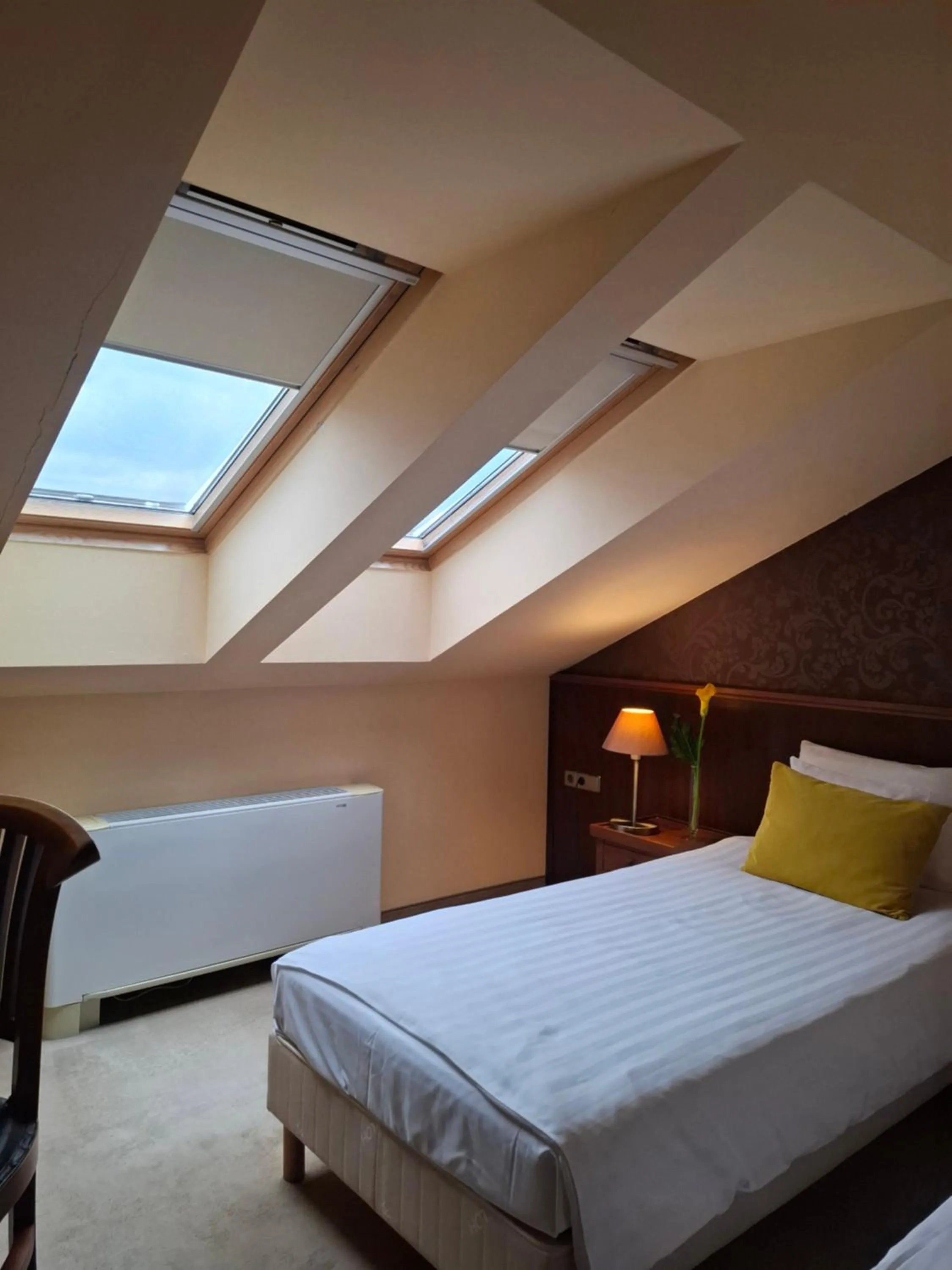 Bed in Szépia Bio and Art Hotel