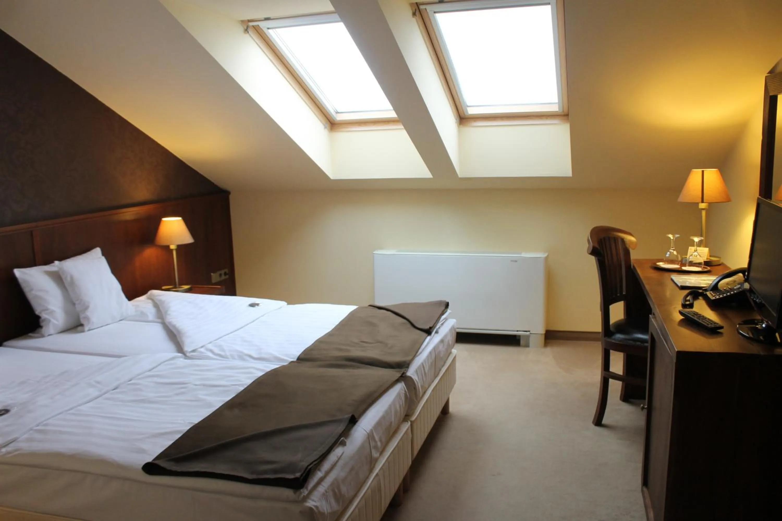 Bed in Szépia Bio and Art Hotel