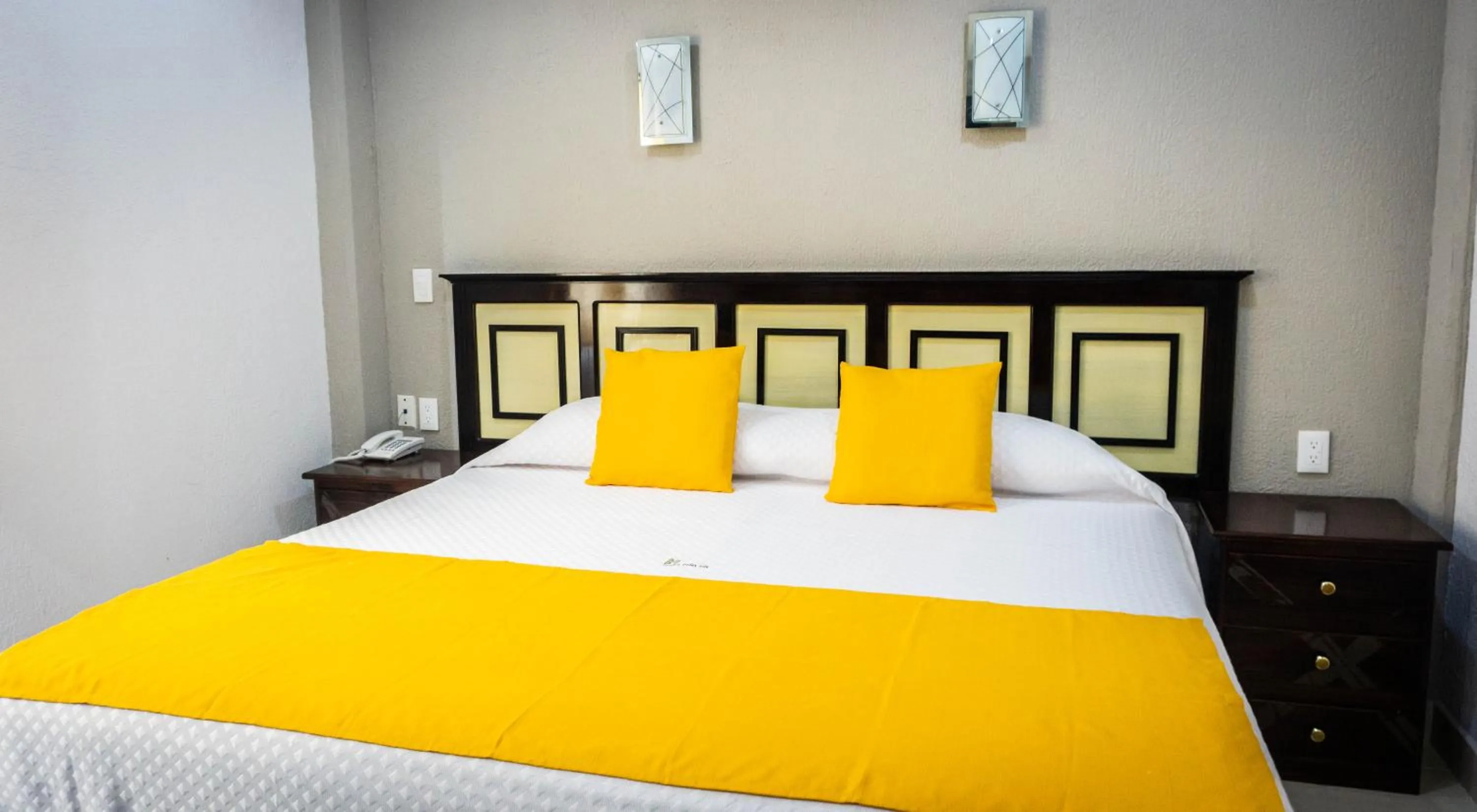 Bed in HOTEL DE LA PEÑA INN