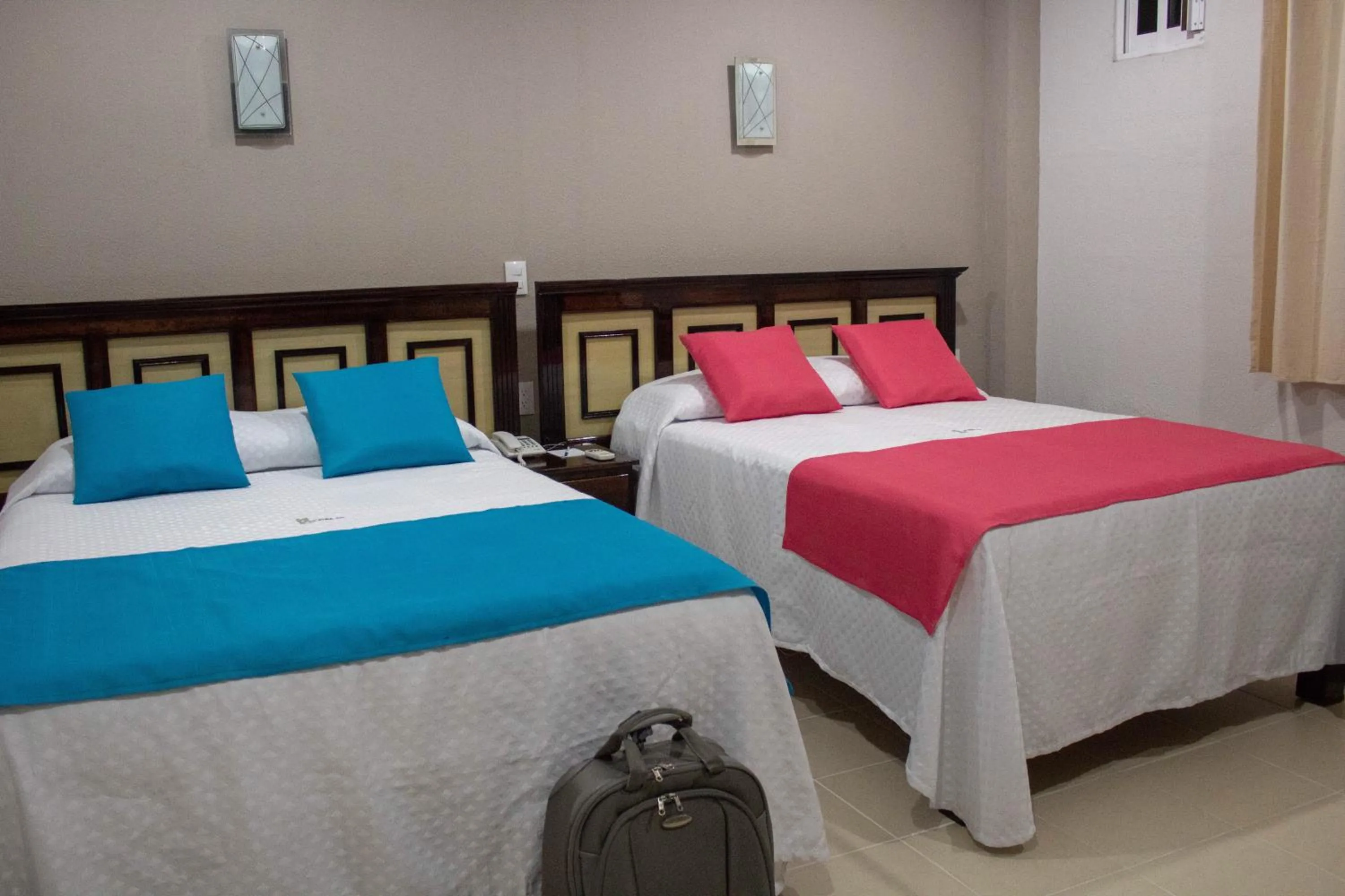 Bed in HOTEL DE LA PEÑA INN