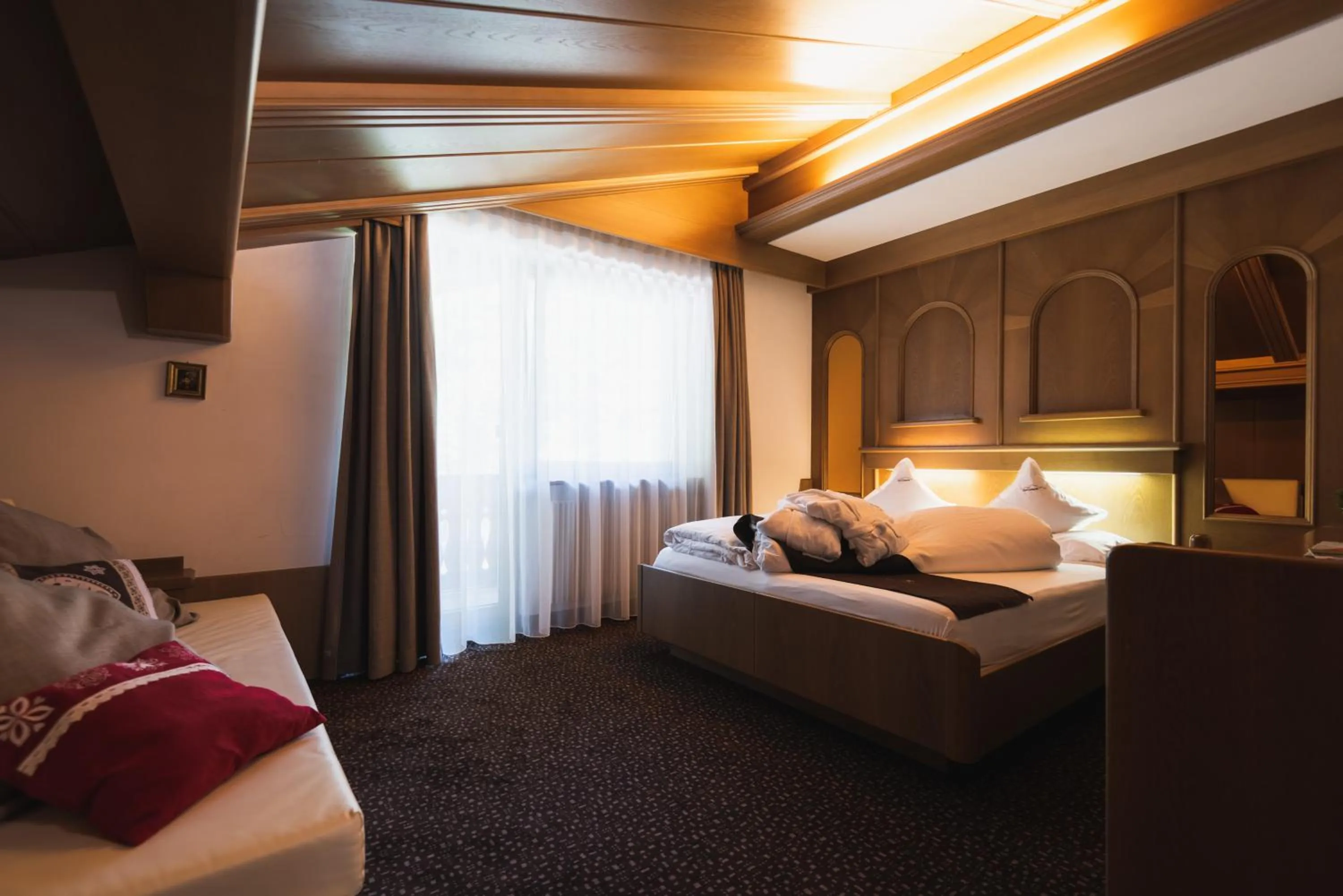 Bed in Hotel Catinaccio