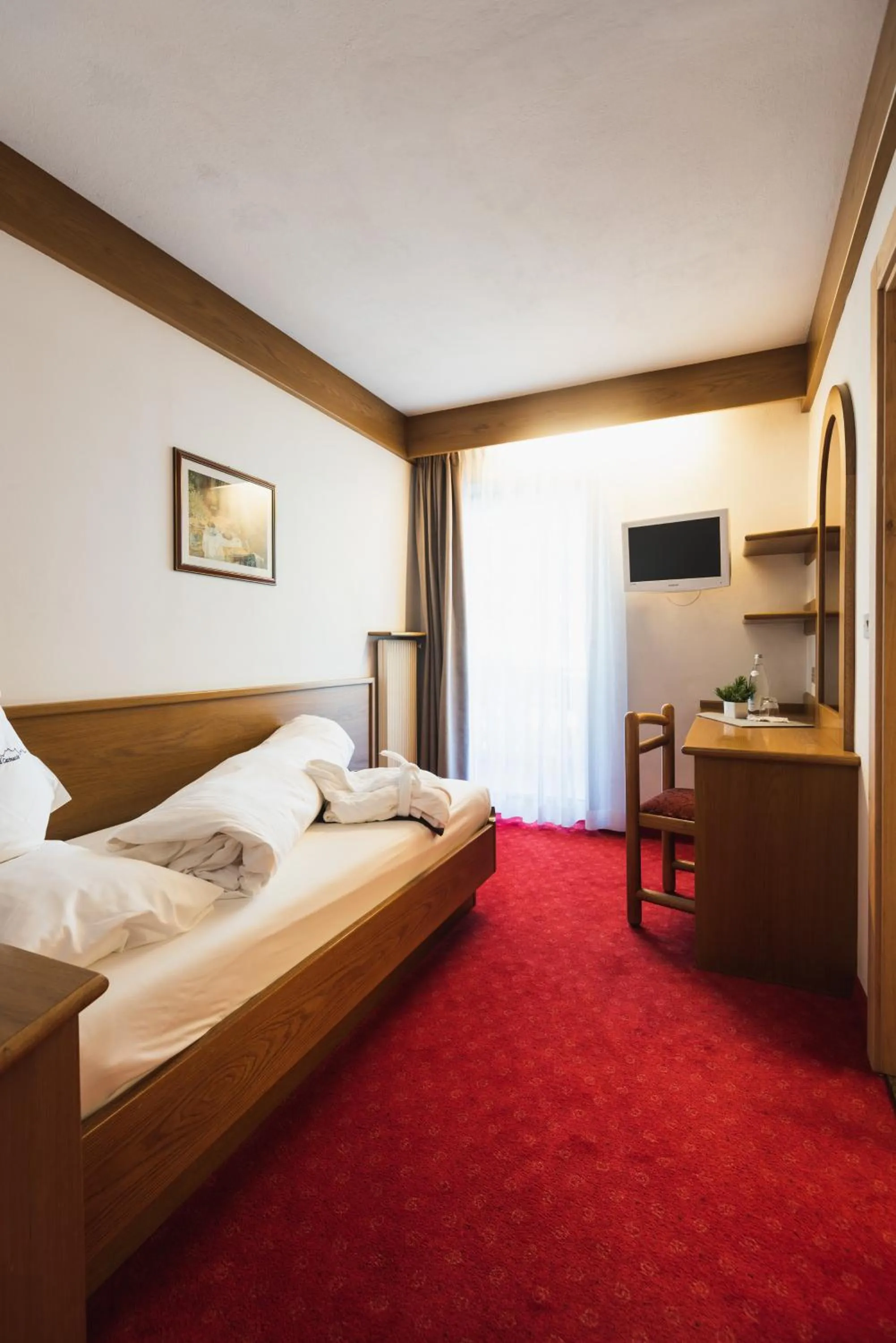 Bed in Hotel Catinaccio