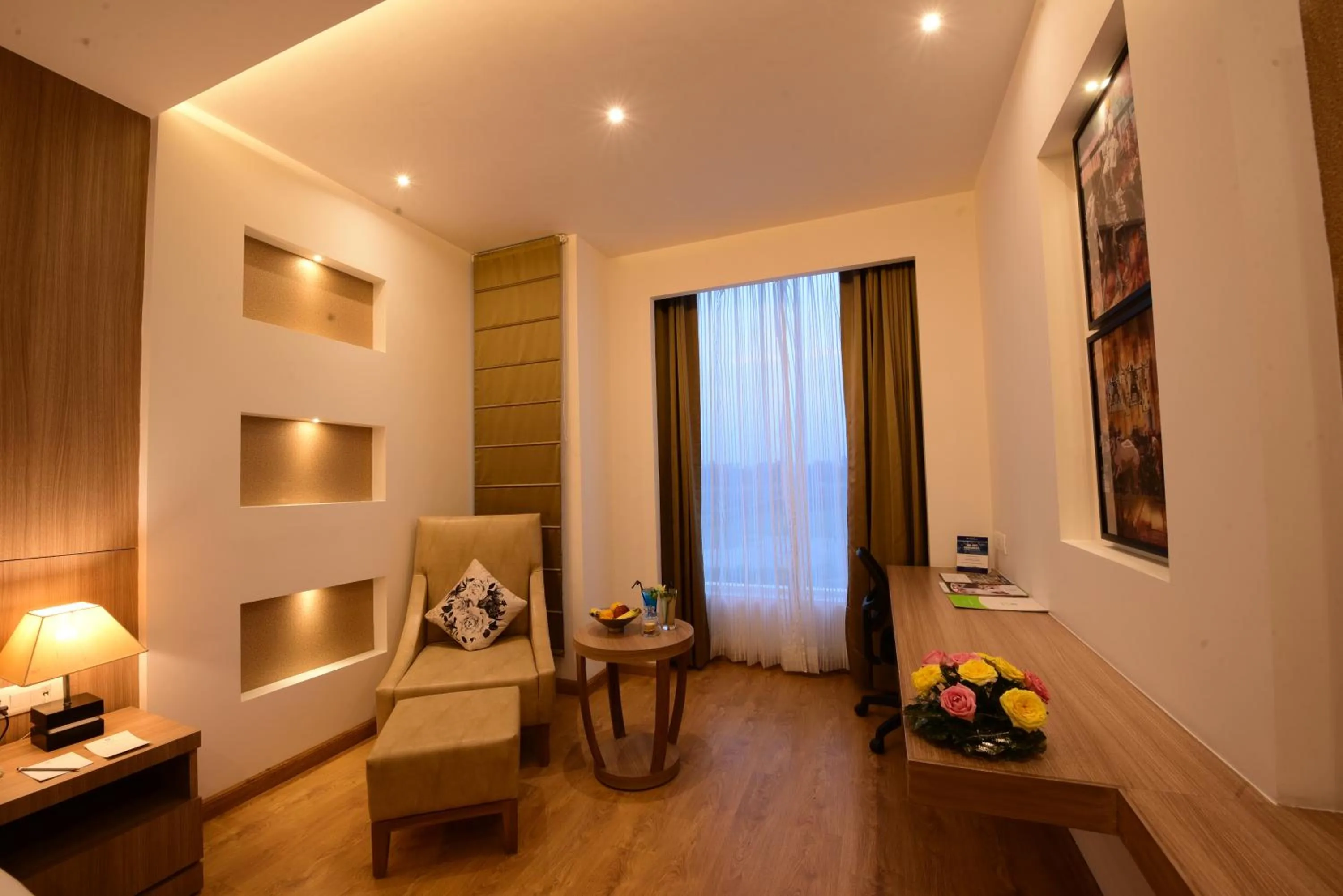 Living room in SureStay Plus by Best Western Amritsar