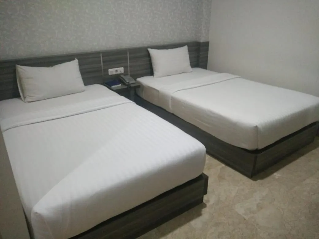 Bed in Tulip Guest House