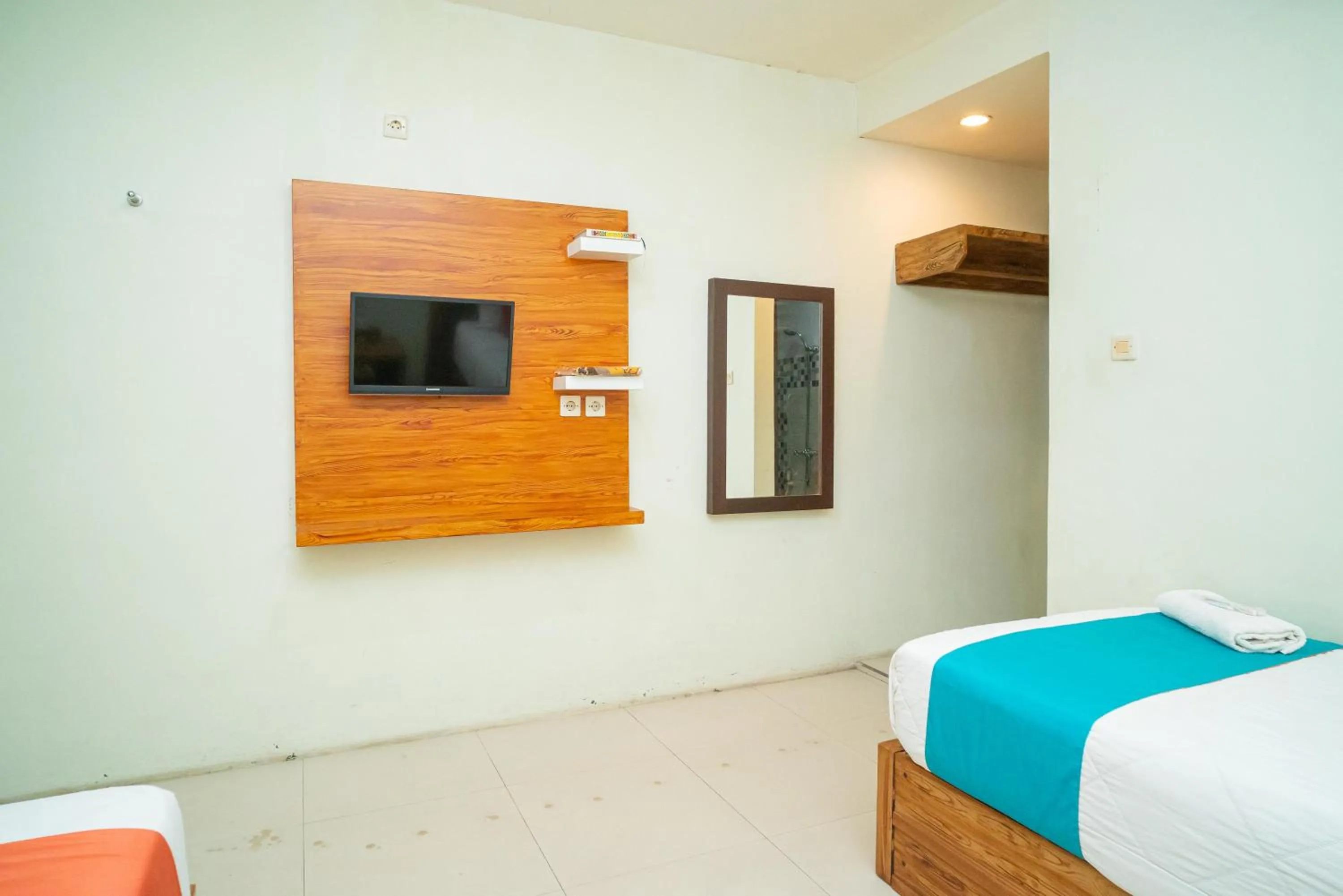 Bedroom, Bed in Sans Hotel Zam-Zam Syariah Palangkaraya