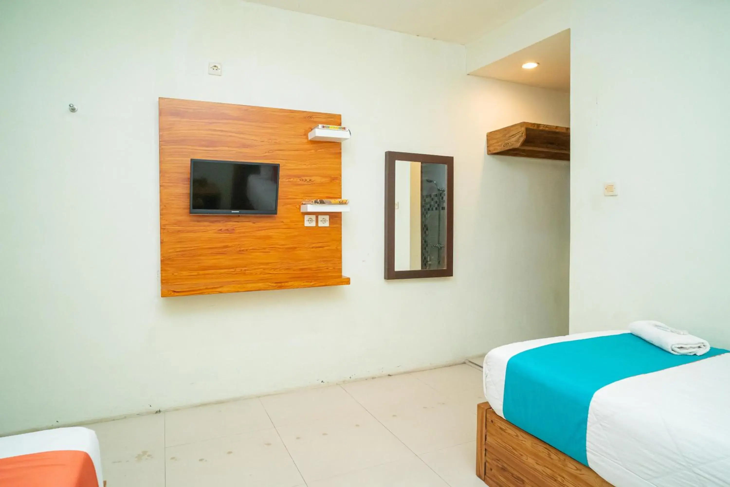 Superior Twin Room in Sans Hotel Zam-Zam Syariah Palangkaraya Superior Twin Room in Sans Hotel Zam-Zam Syariah Palangkaraya