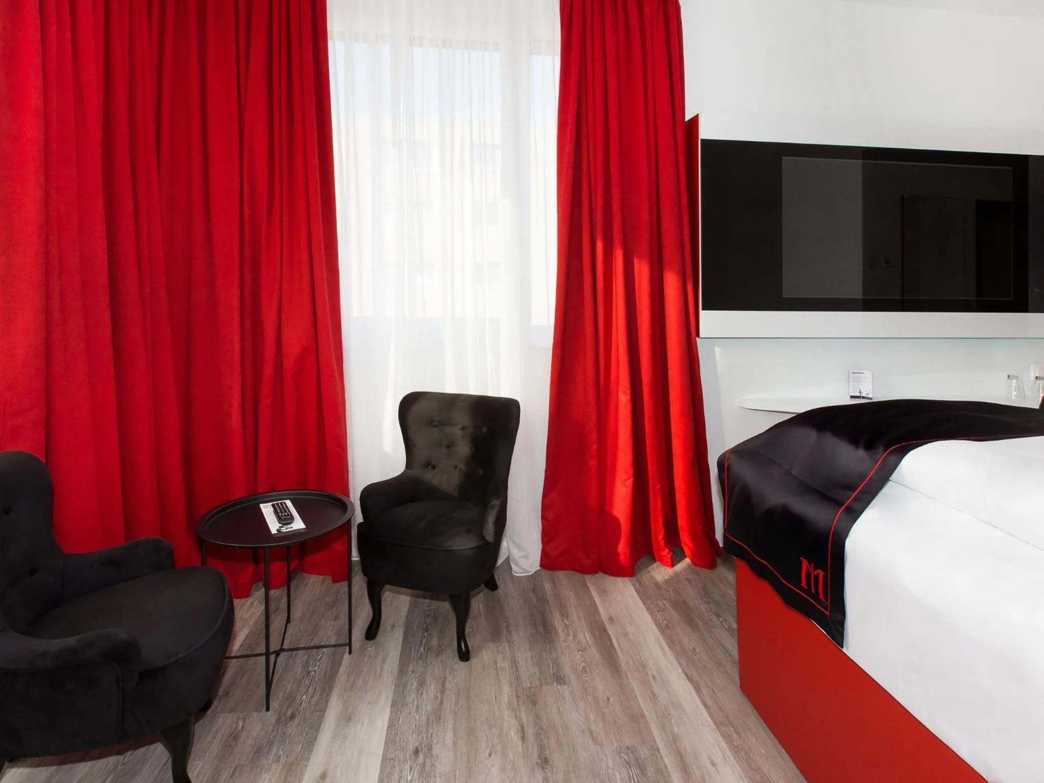 Photo of the whole room, Bed in DORMERO Hotel Salzgitter