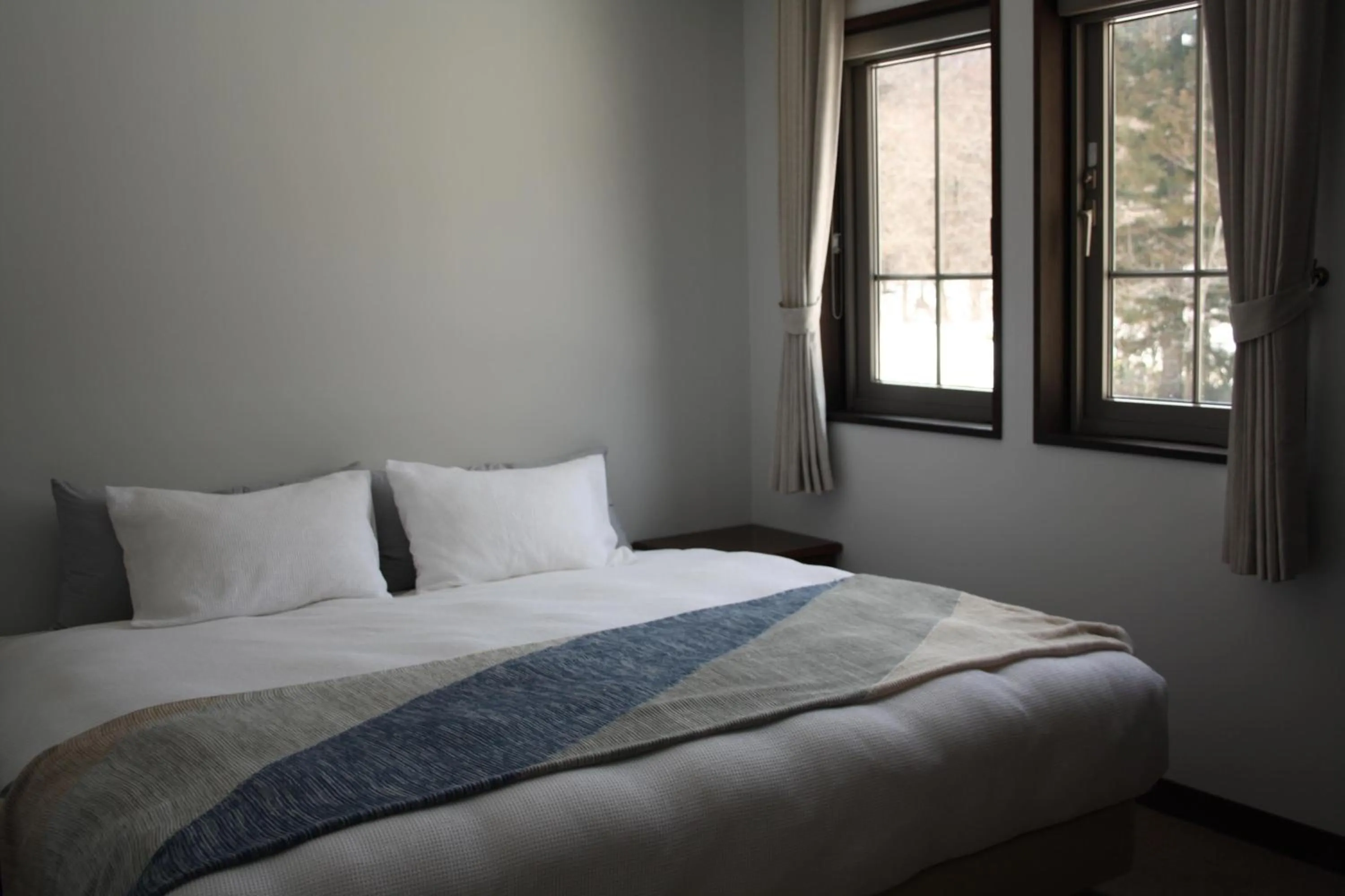 Bed in Legend Inn Myoko