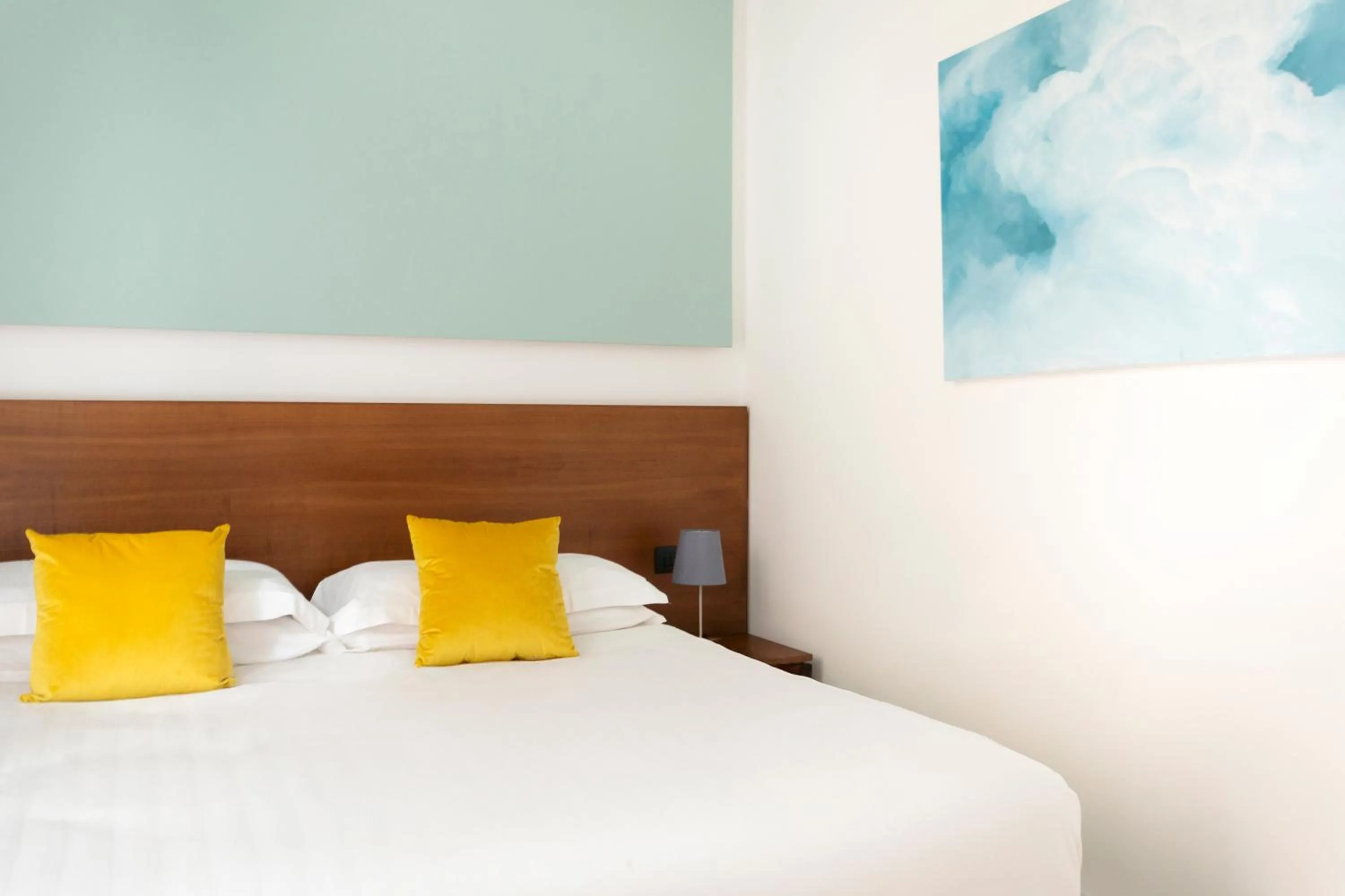 Bed in Palazzo Sovrana Serviced Luxury Apartments