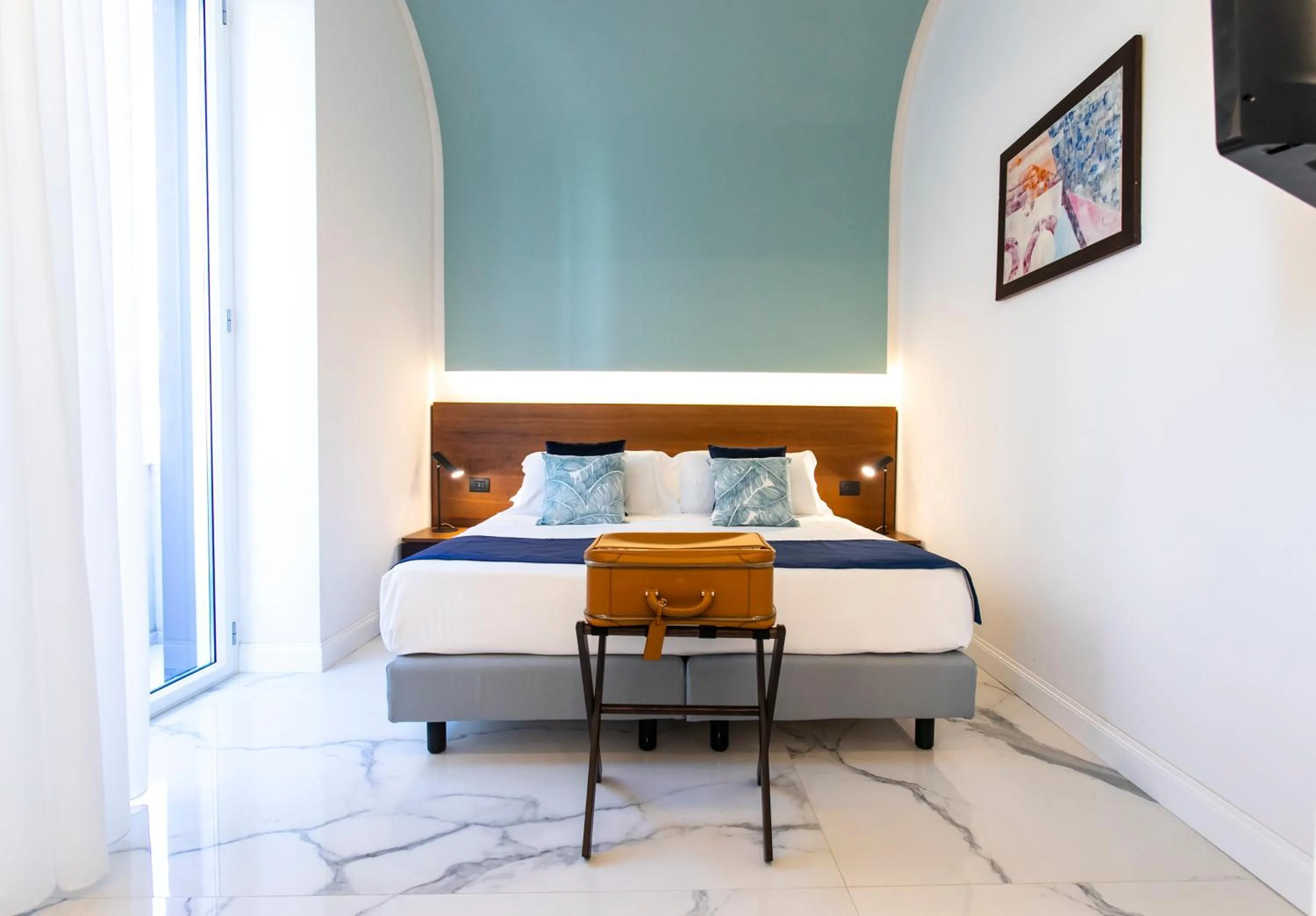 Bed in Palazzo Sovrana Serviced Luxury Apartments