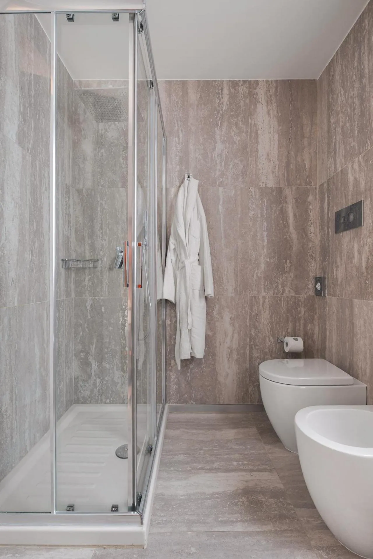 Shower in Palazzo Sovrana Serviced Luxury Apartments