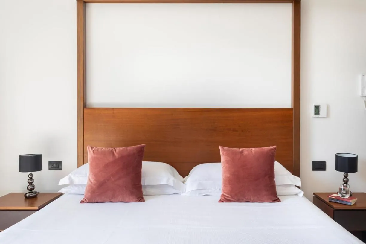 Bed in Palazzo Sovrana Serviced Luxury Apartments