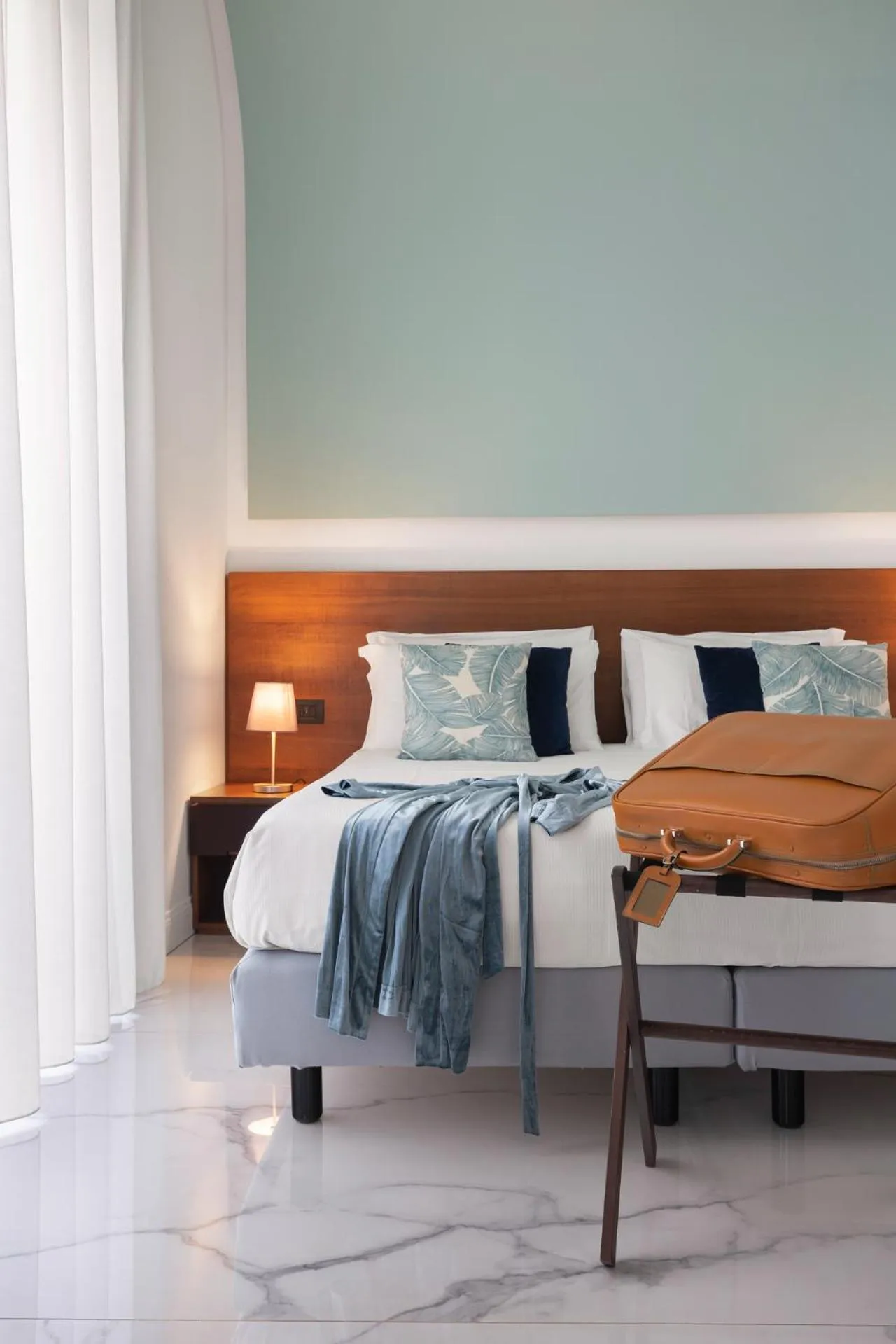 Bed in Palazzo Sovrana Serviced Luxury Apartments