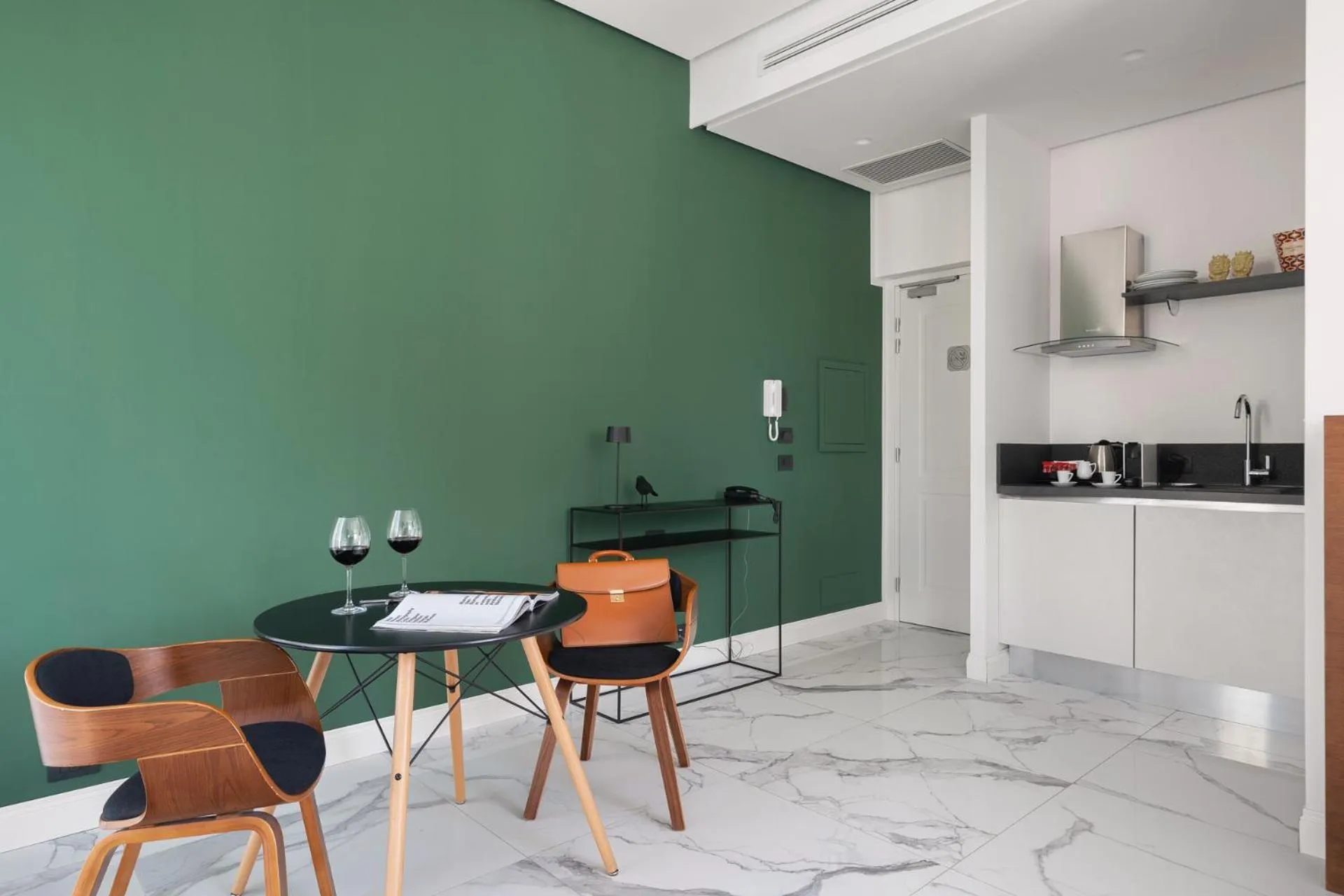 Dining area in Palazzo Sovrana Serviced Luxury Apartments