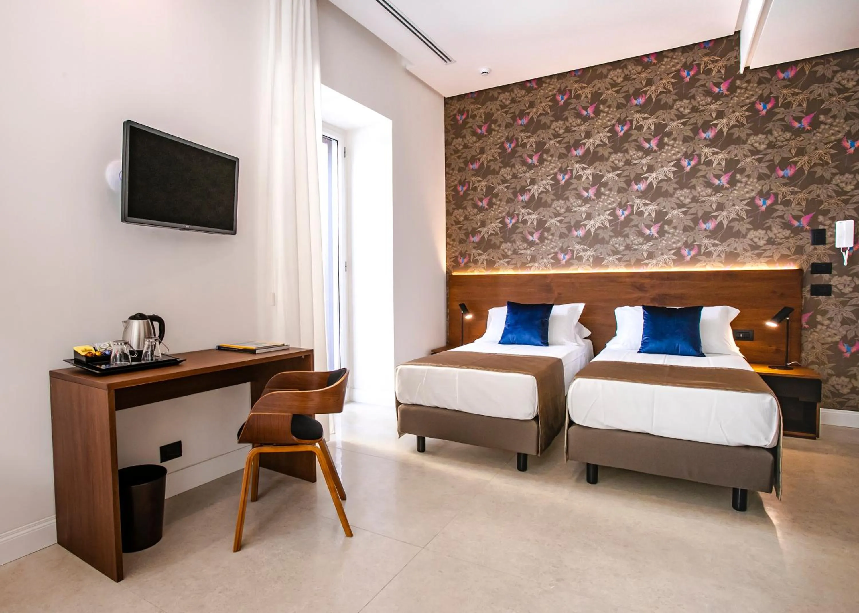 Bed in Palazzo Sovrana Serviced Luxury Apartments