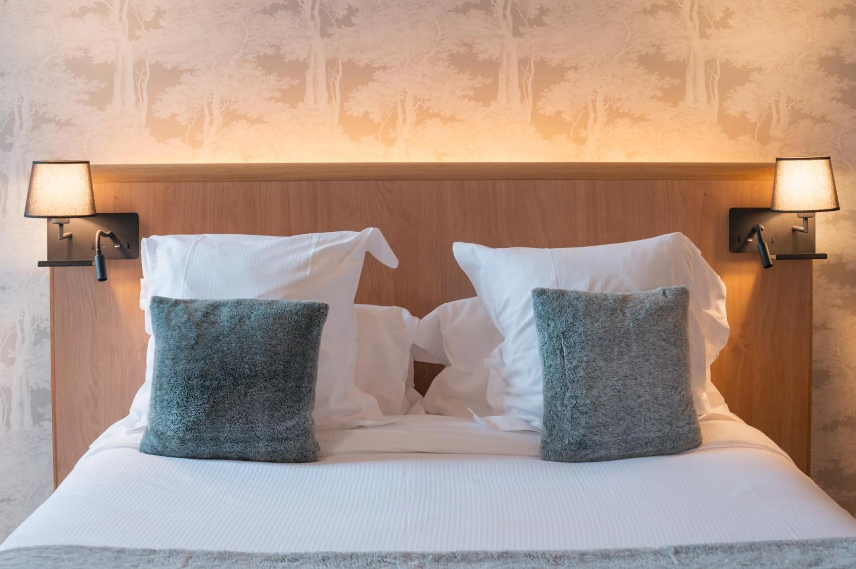 Bed in Le Monastère de Saint Mont Hôtel & Spa