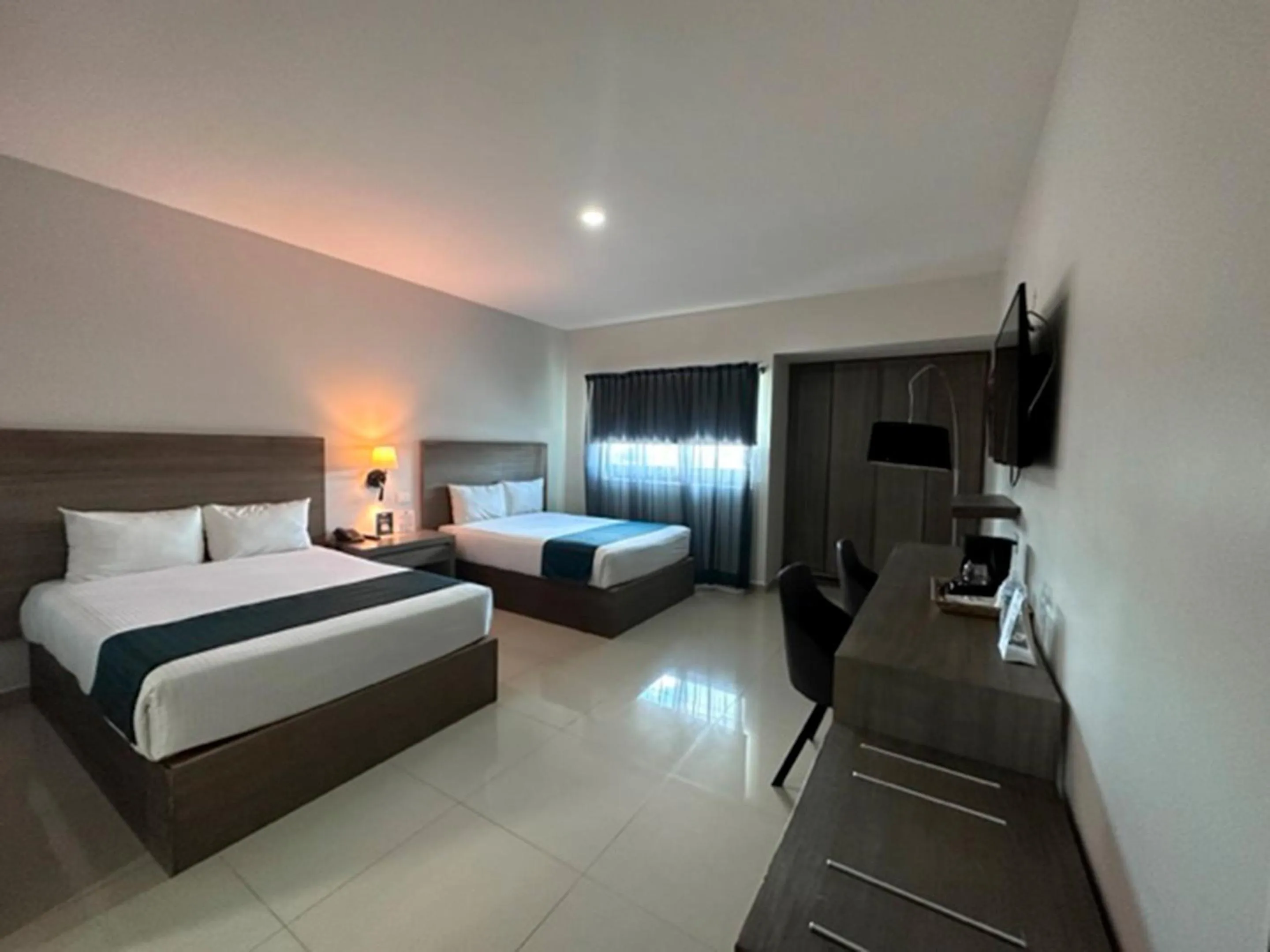 Bed in InHouse Hotel Culiacán