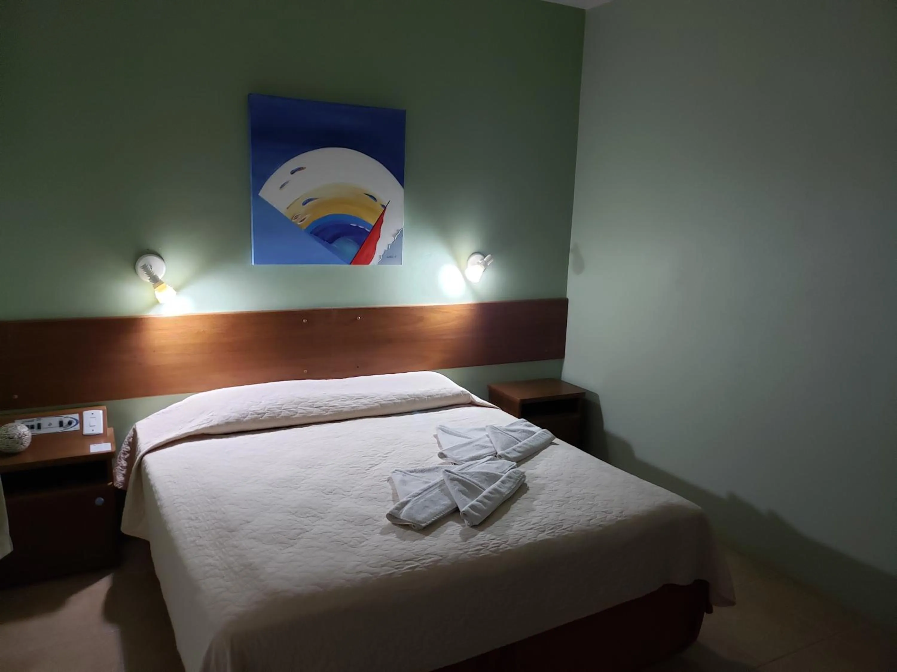 Bed in De Rose Praia Hotel