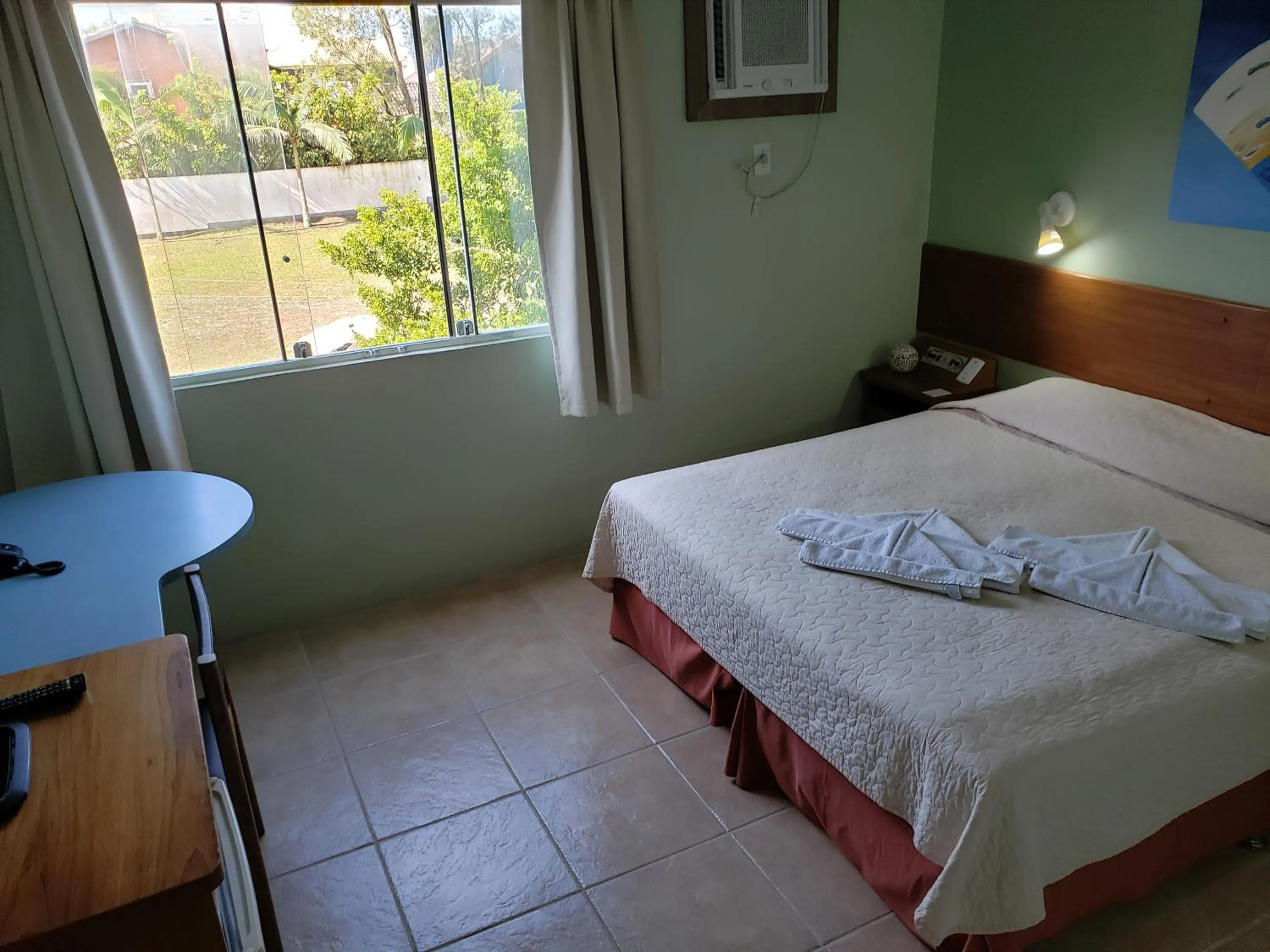 Bed in De Rose Praia Hotel