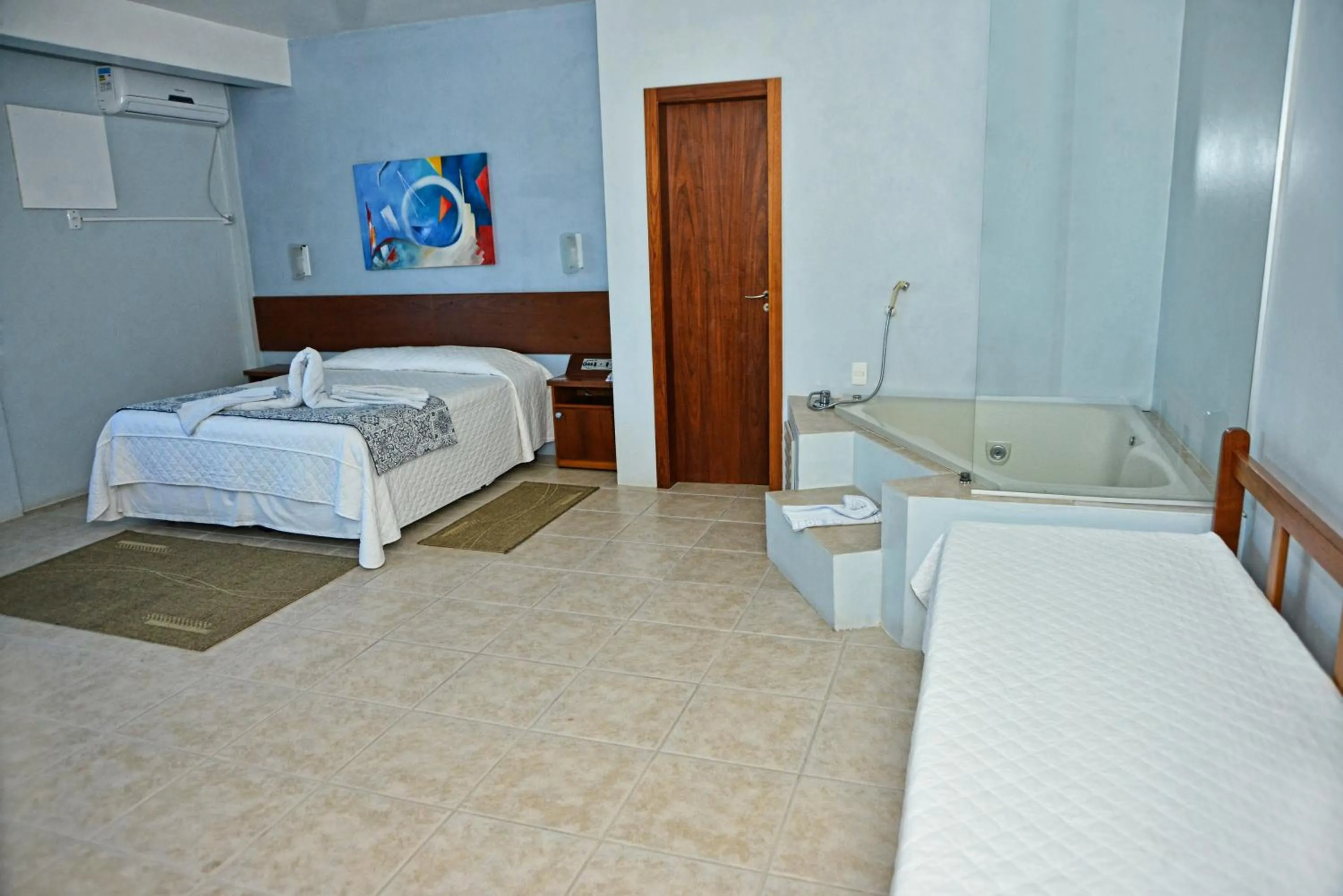 Bed in De Rose Praia Hotel