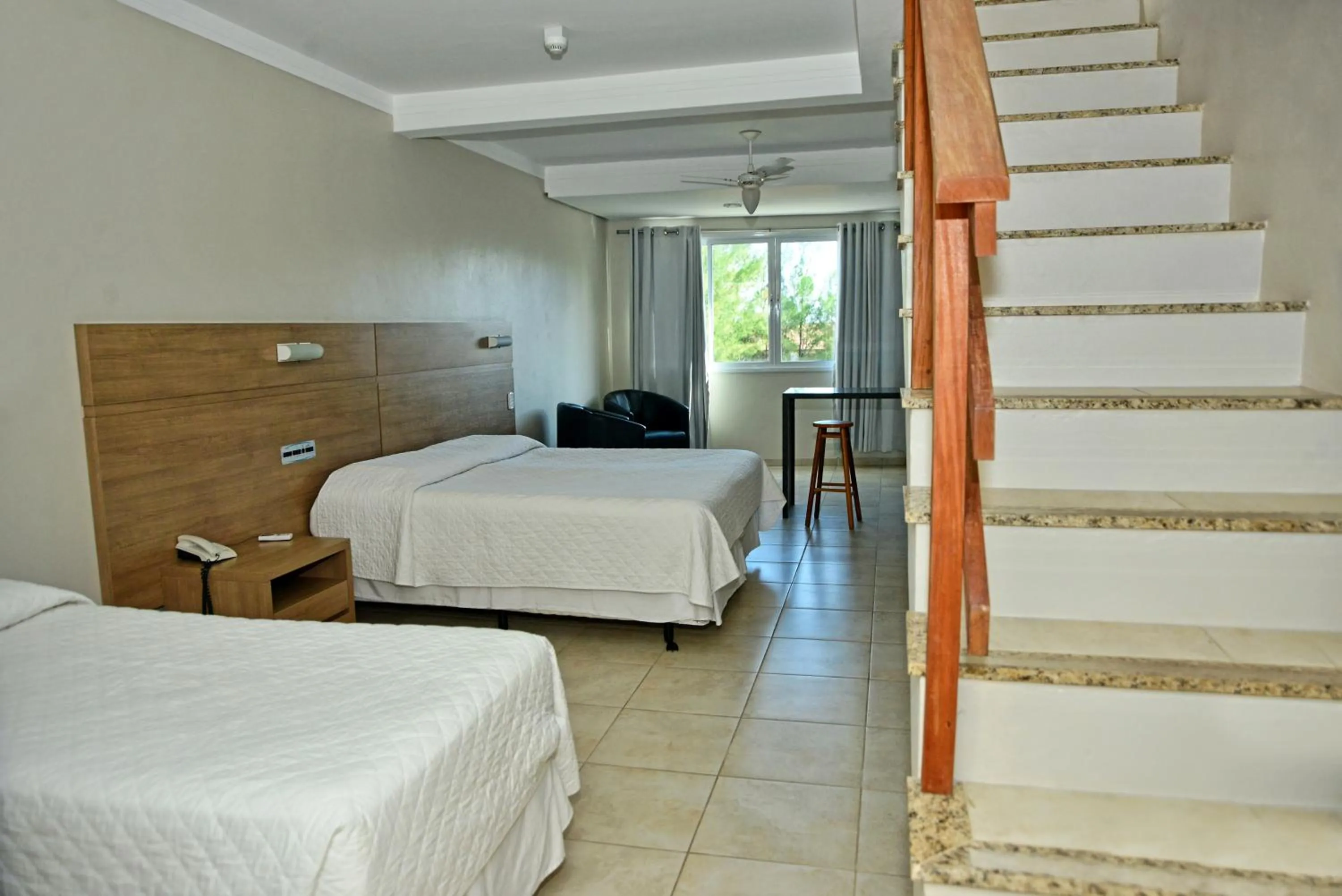 Bed in De Rose Praia Hotel