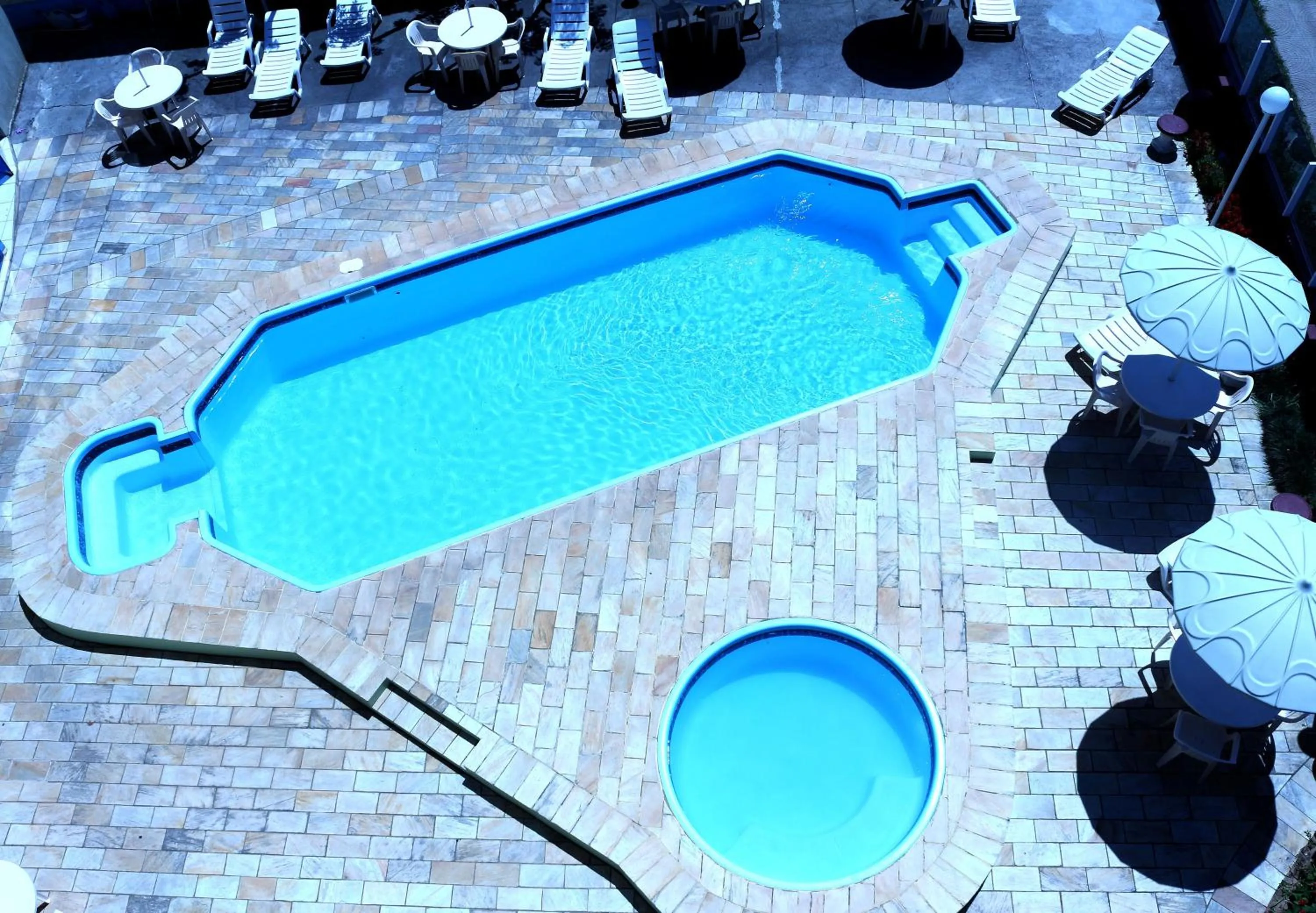 Swimming pool in De Rose Praia Hotel