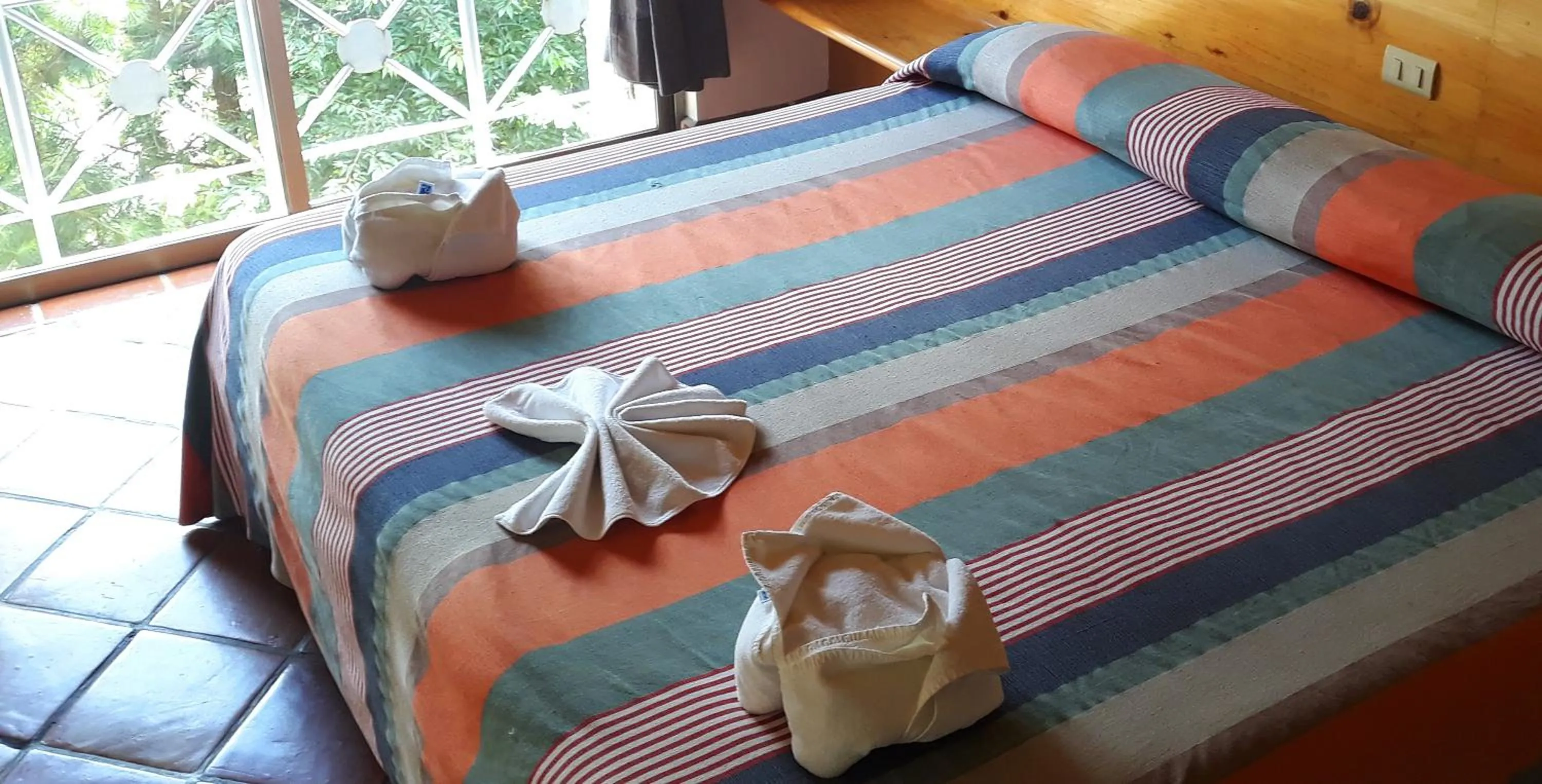 Bed in Axkan Arte Hotel