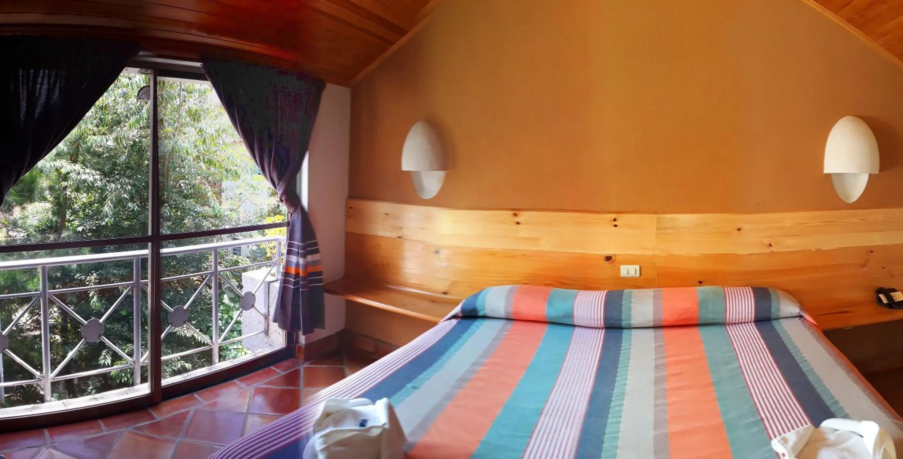 Bed in Axkan Arte Hotel