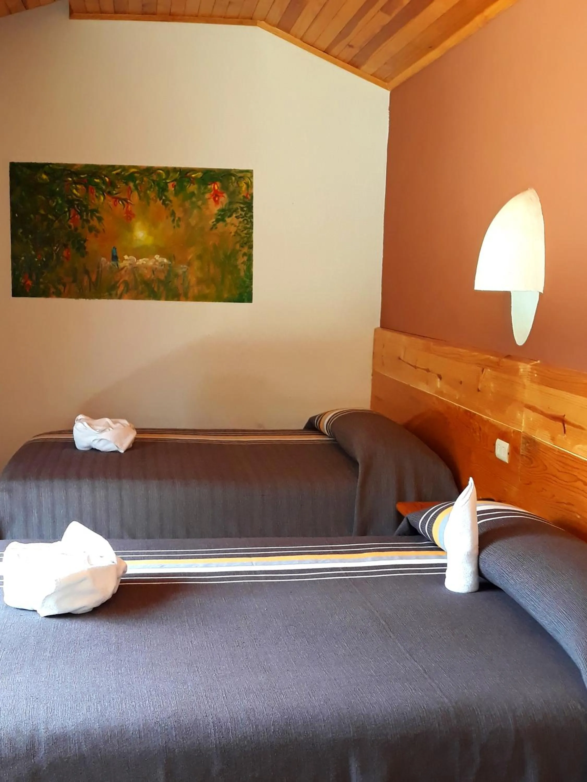 Bed in Axkan Arte Hotel