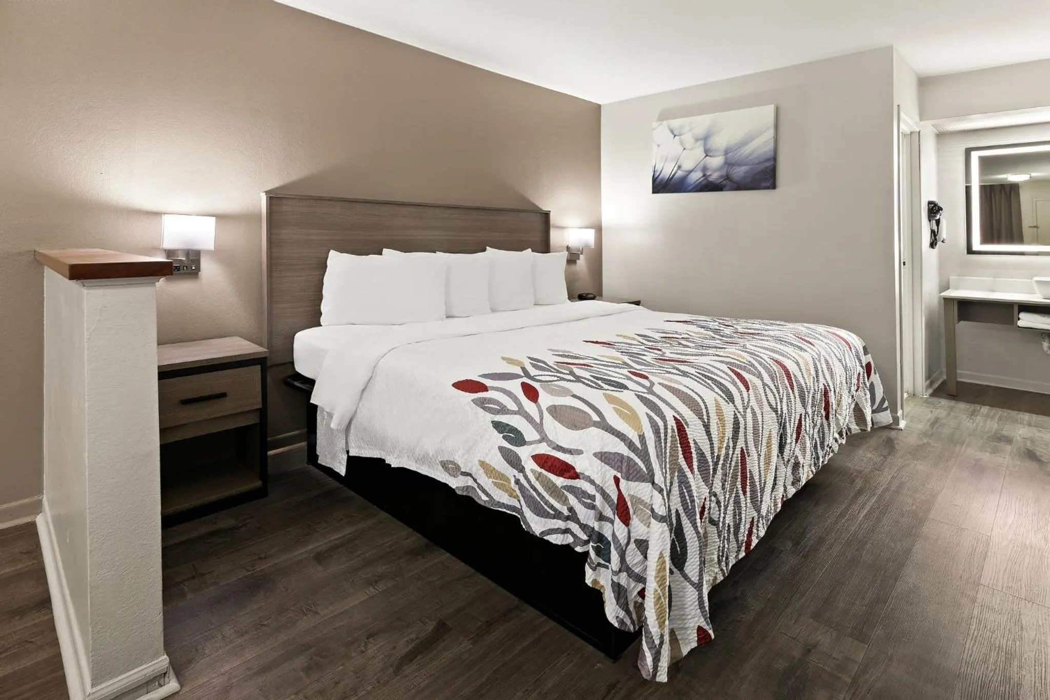 Photo of the whole room, Bed in Red Roof Inn & Suites Monroe, NC