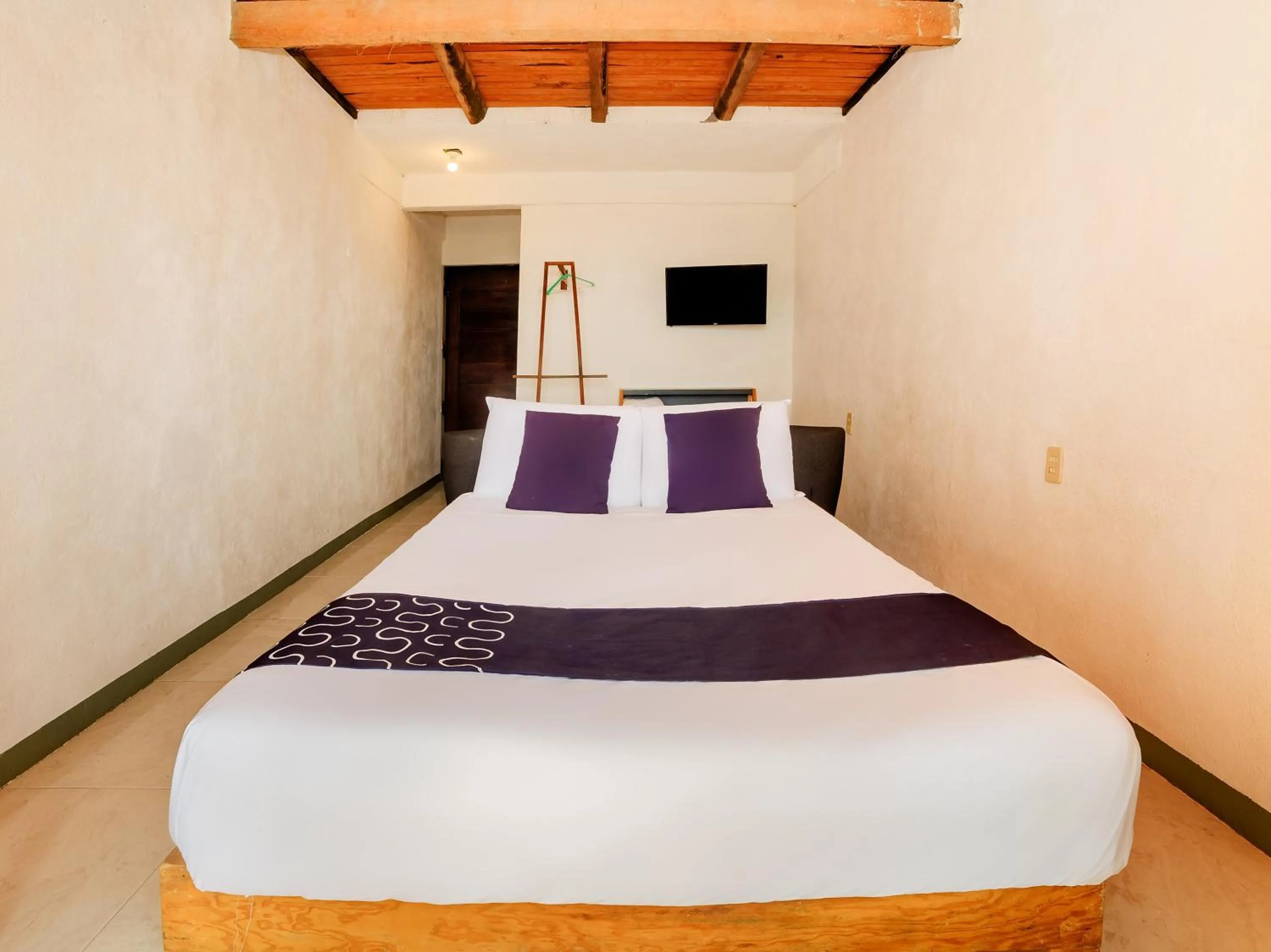 Bedroom in Capital O Verdemar, Pie de la Cuesta