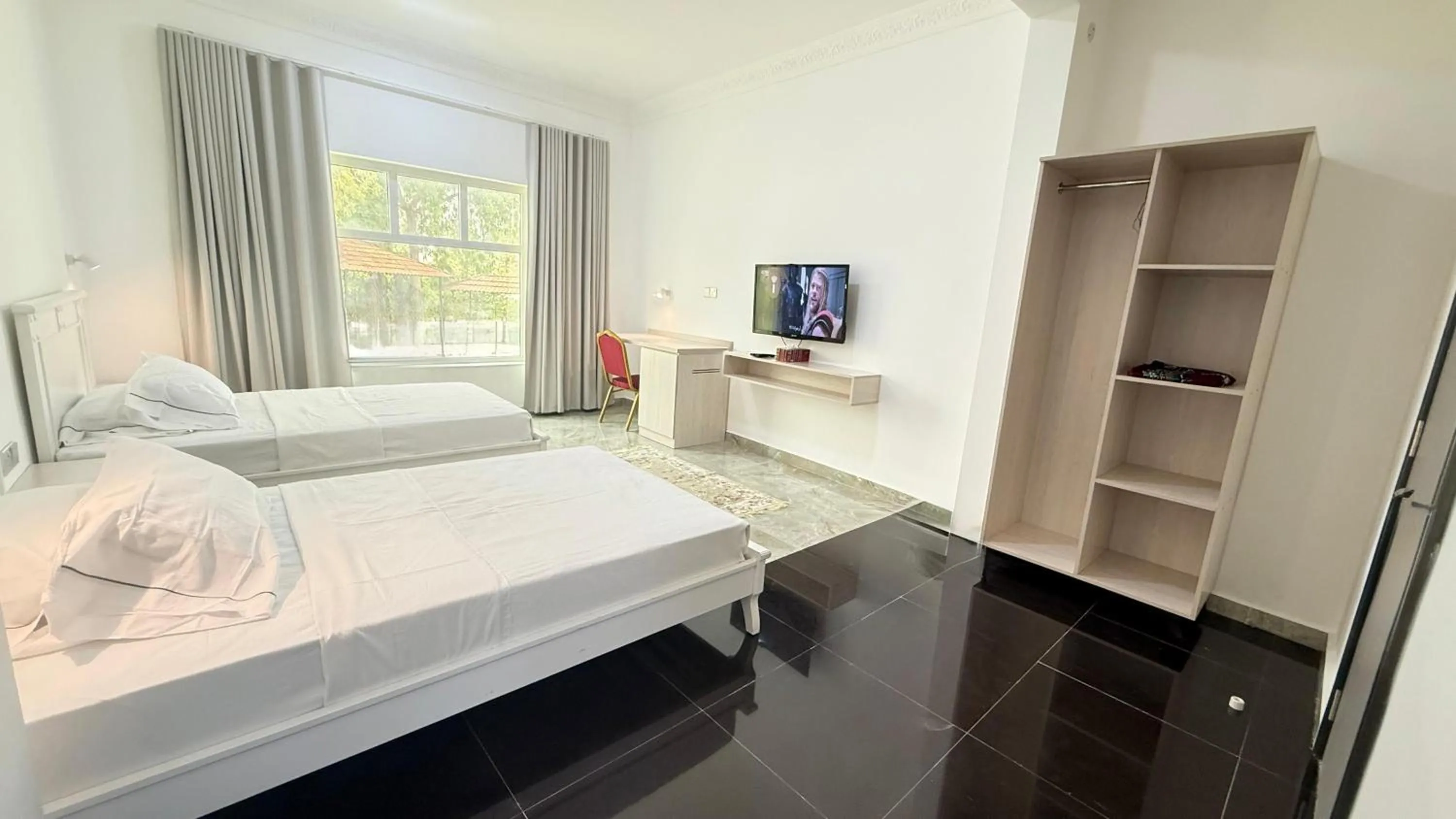 Photo of the whole room, Bed in Oriental Nights Rest House