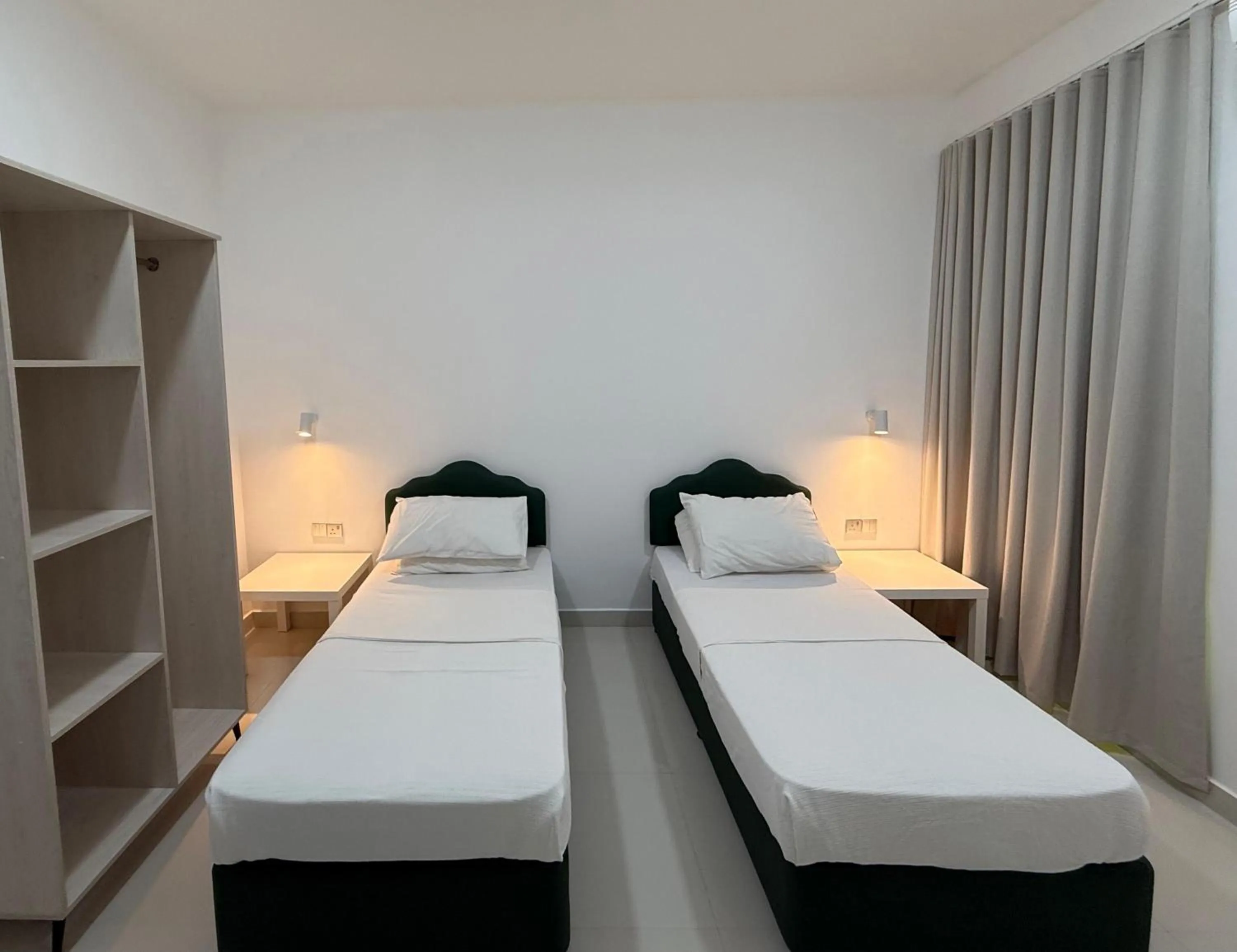 Bed in Oriental Nights Rest House