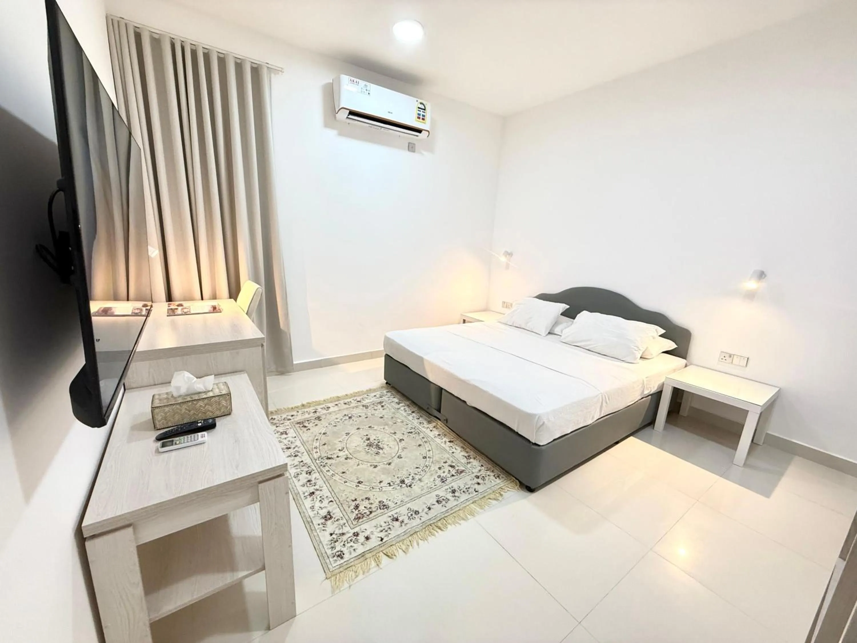 Bed in Oriental Nights Rest House