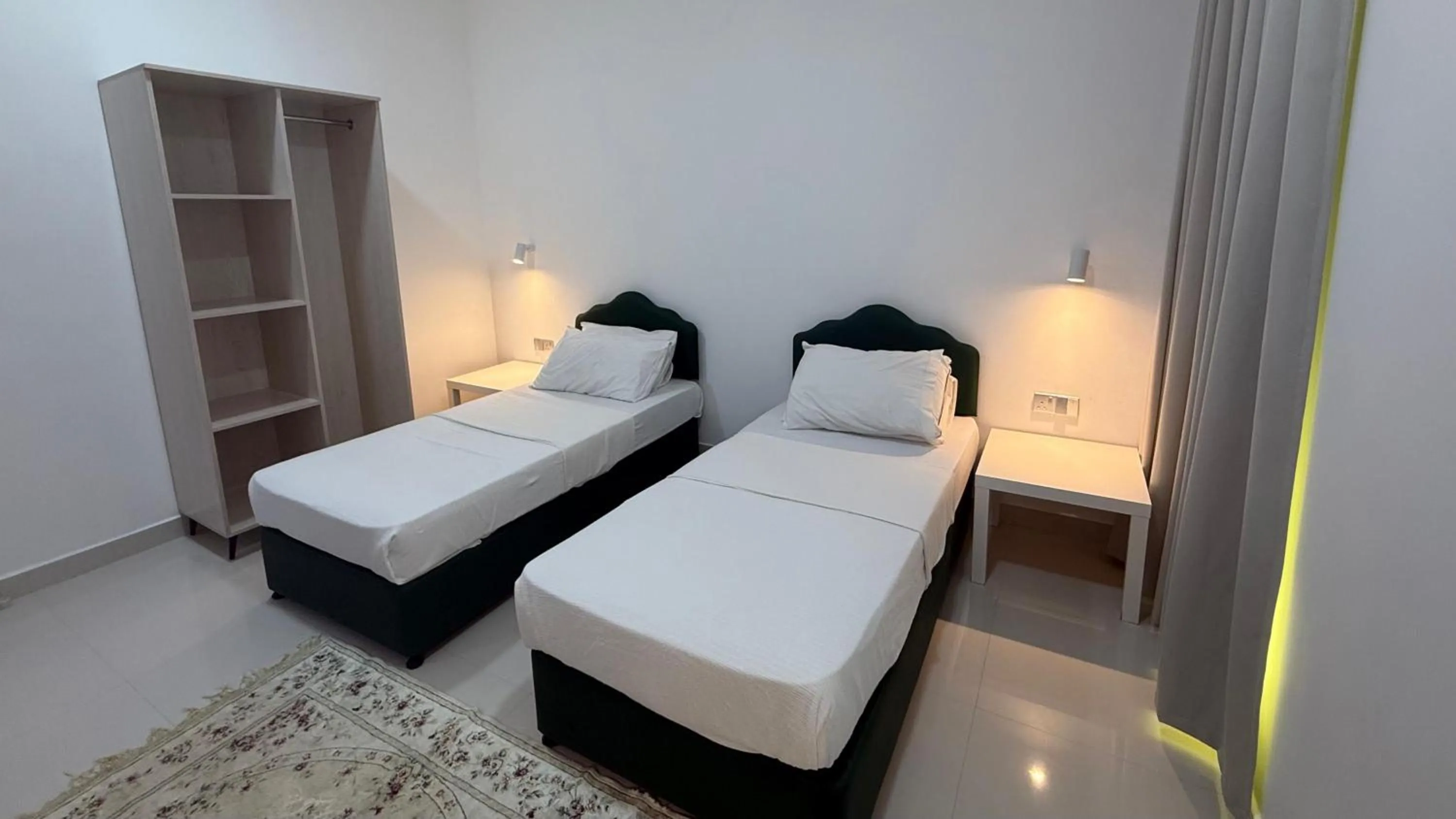 Bed in Oriental Nights Rest House