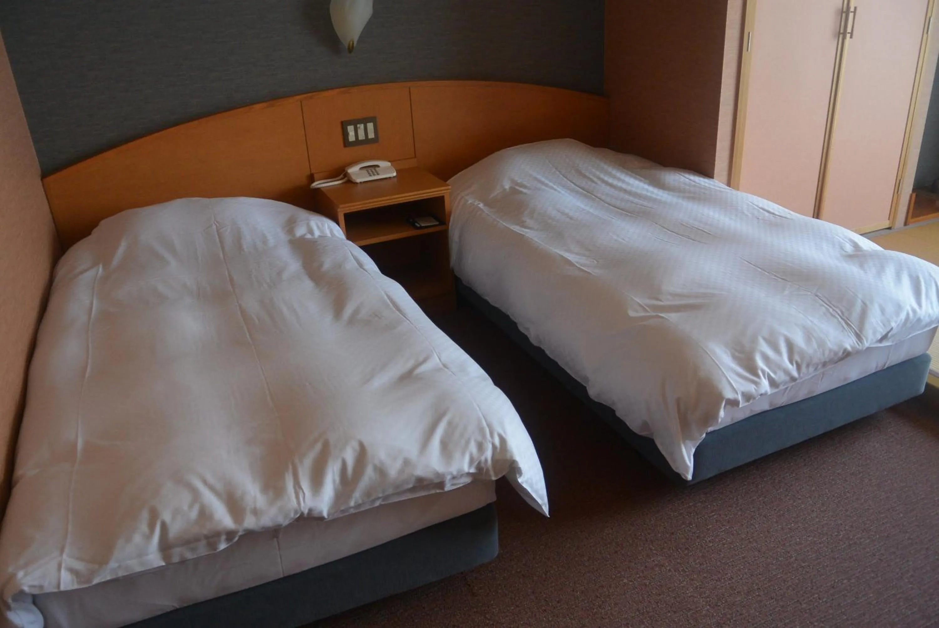 Bed in Shiretoko Noble Hotel