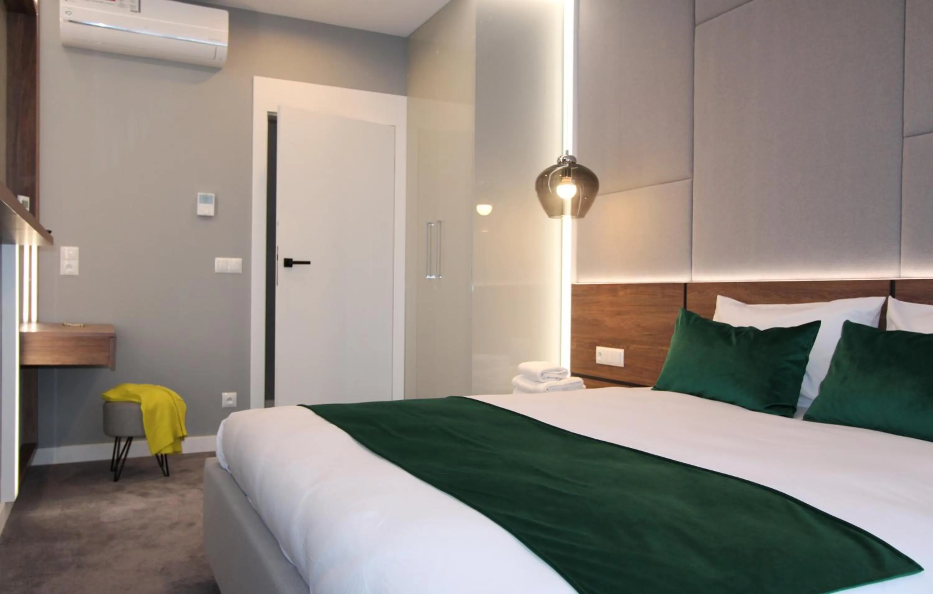 Bed in Lubicz Luxury Apartment