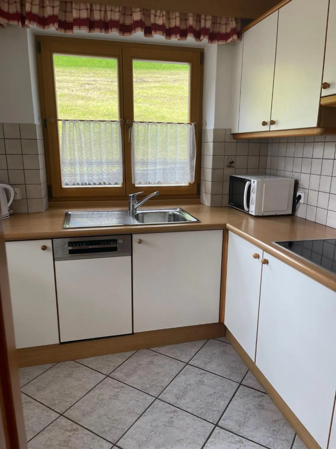 Kitchen or kitchenette in Residence Bondì