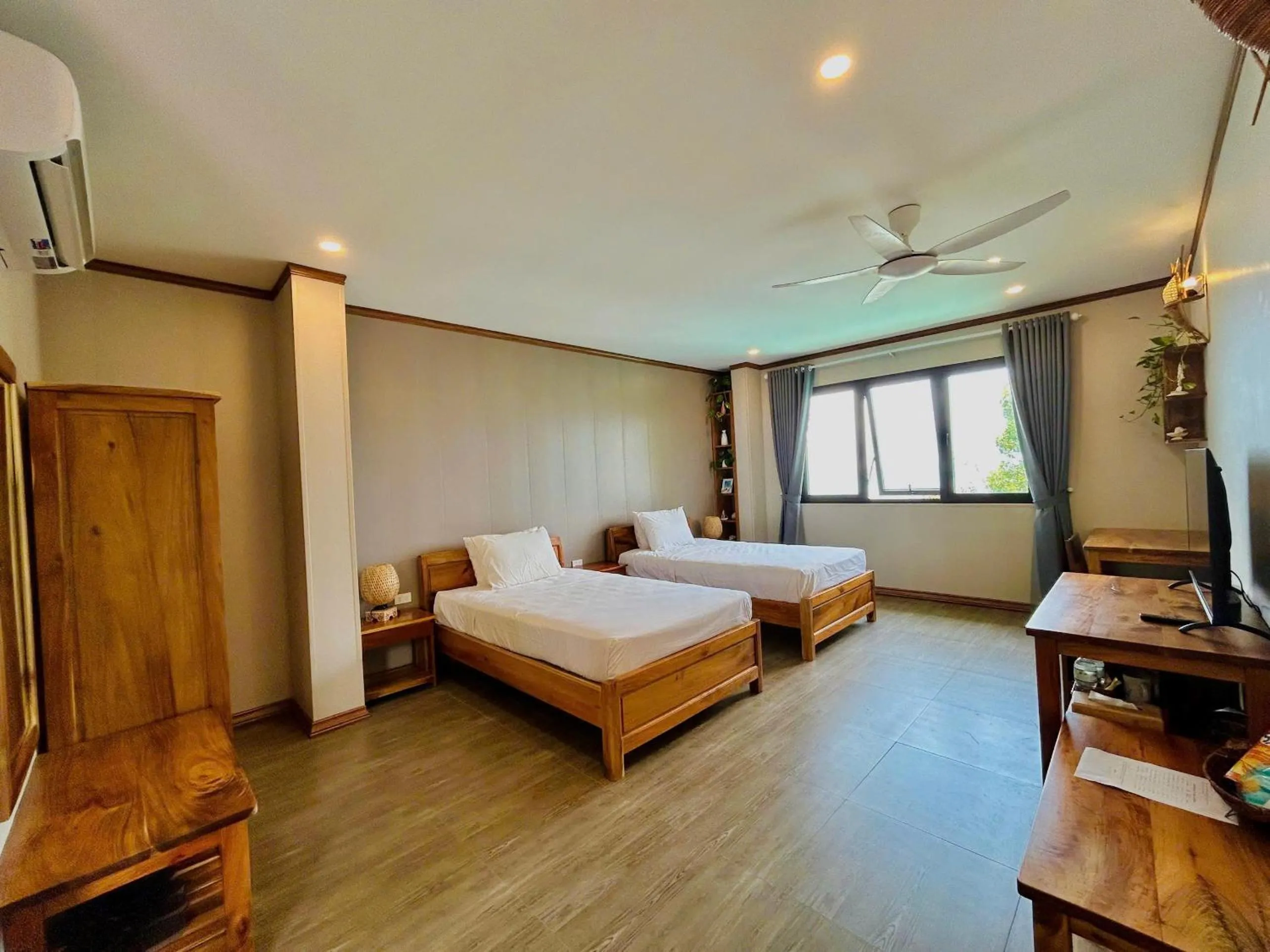 Bed in Ancarine Beach Resort