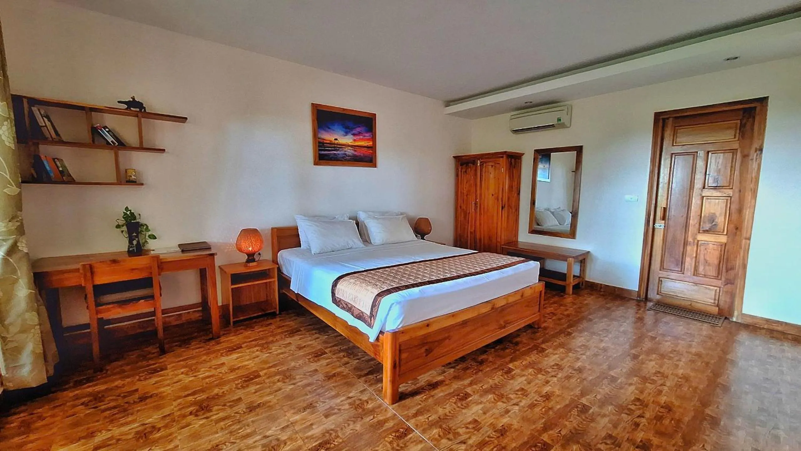 Bed in Ancarine Beach Resort